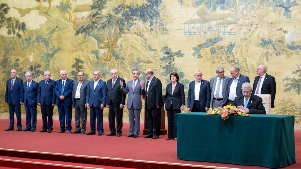 Chinese Foreign Minister Wang Yi, also a member of the Political Bureau of the Communist Party of China Central Committee, attends the closing ceremony of a reconciliation dialogue among Palestinian factions and witnesses the signing of a declaration on ending division and strengthening unity by 14 Palestinian factions, in Beijing, capital of China, July 23, 2024. /Xinhua