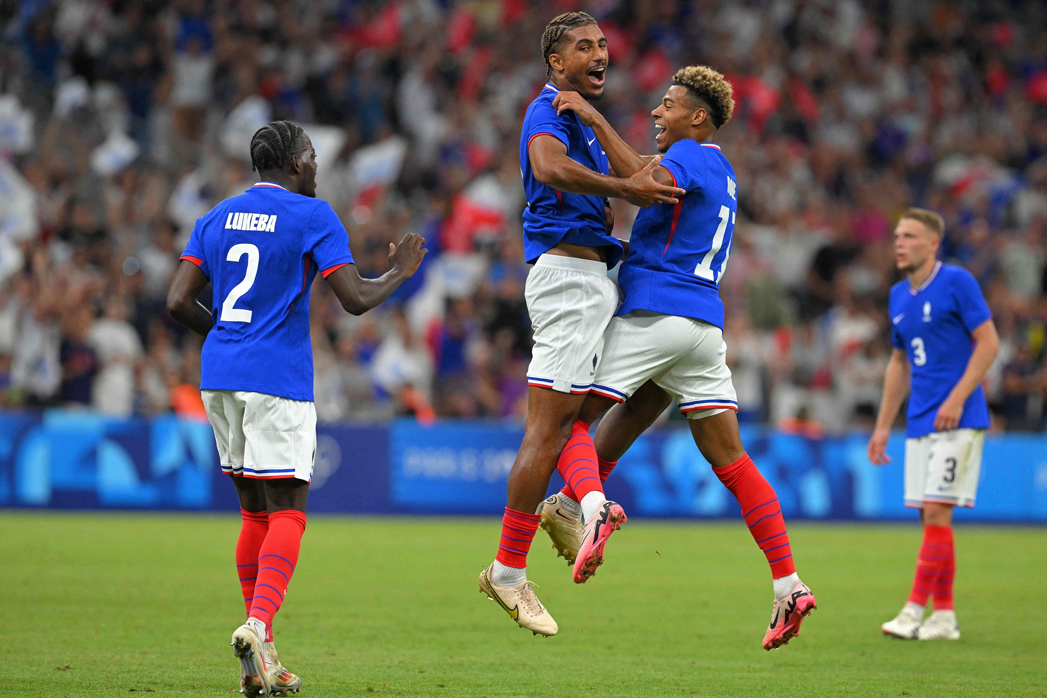 Players from France celebrate after scoring a goal in their men's football game against the USA at the 2024 Summer Olympics in Marseille, France, July 24, 2024. /CFP