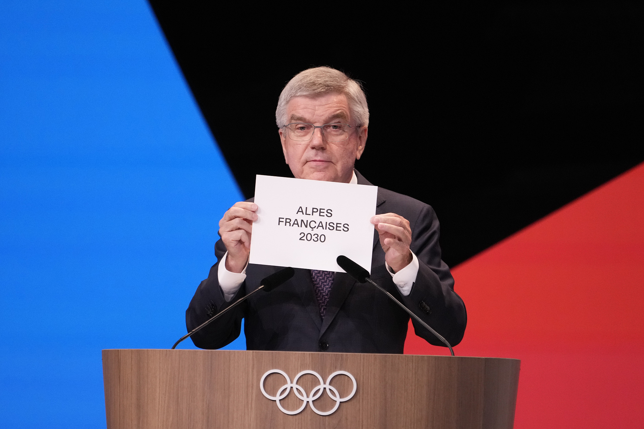 Thomas Bach, President of the International Olympic Committee (IOC), announces that the French Alps will conditionally host the 2030 Winter Olympics at the 142nd IOC Session in Paris, France, July 24, 2024. /CFP