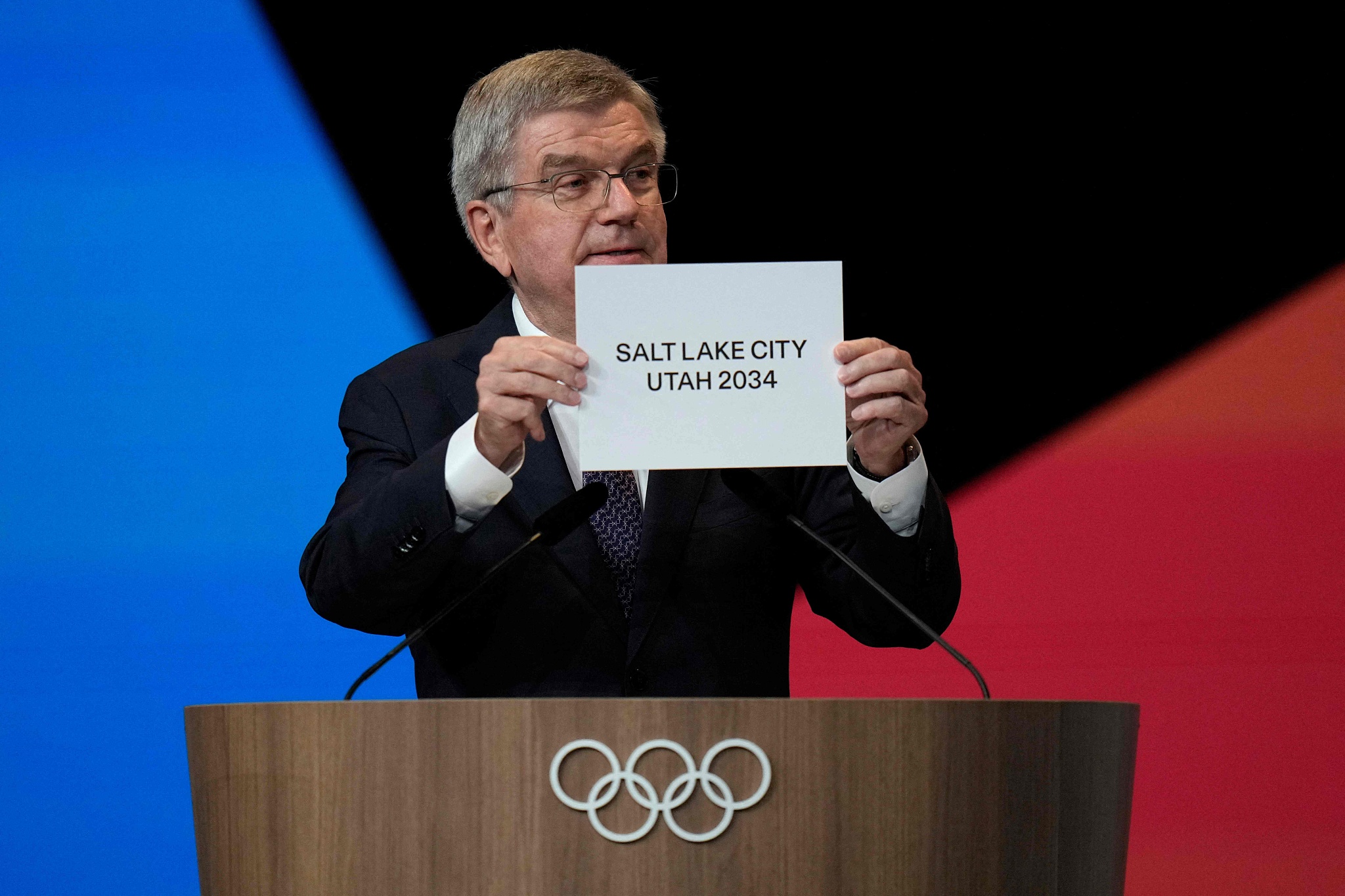 Thomas Bach, President of the International Olympic Committee (IOC), announces that Salt Lake City will host the 2034 Winter Olympics at the 142nd IOC Session in Paris, France, July 24, 2024. /CFP