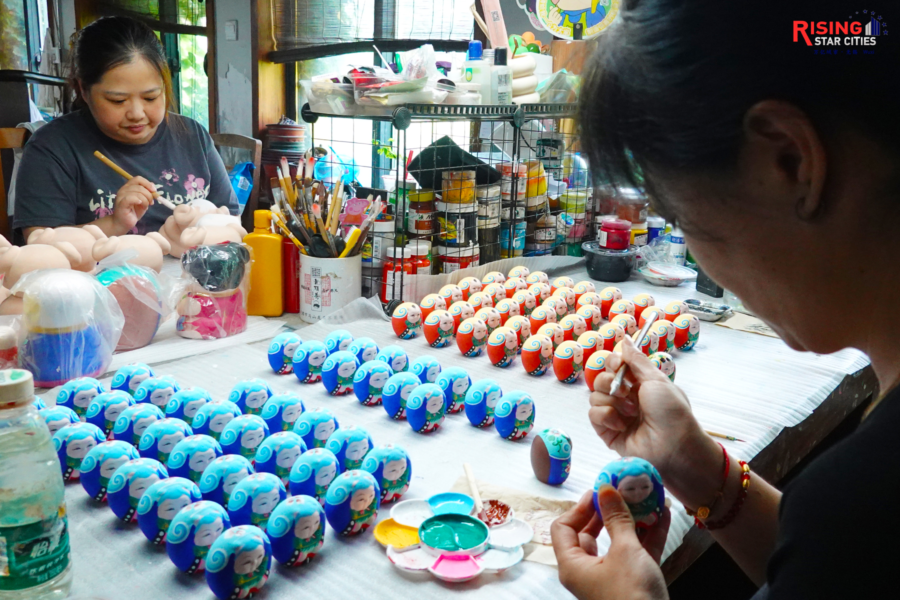 A photo taken on July 23, 2024 shows Huishan clay figurines being made. /CGTN