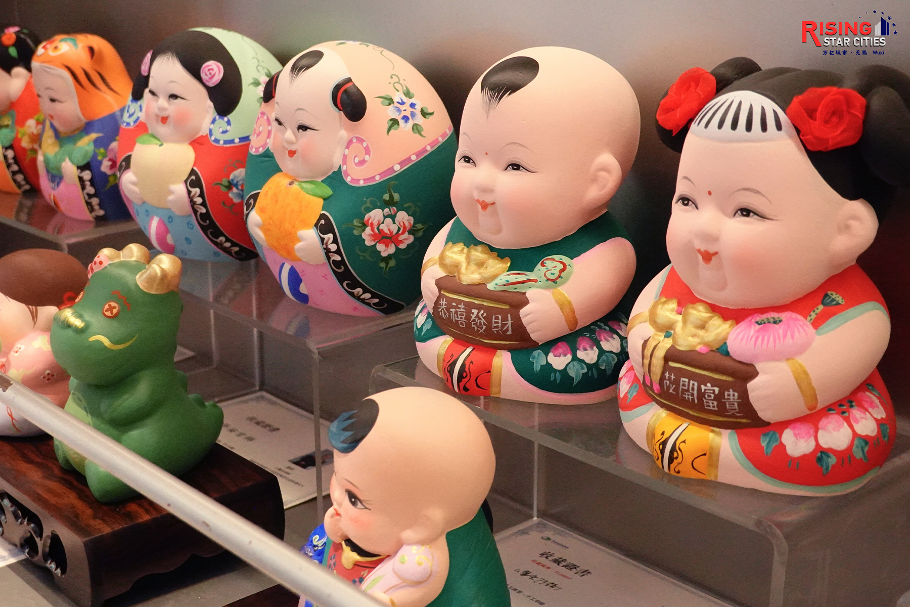 A photo taken on July 23, 2024 shows colorful Huishan clay figurines. /CGTN