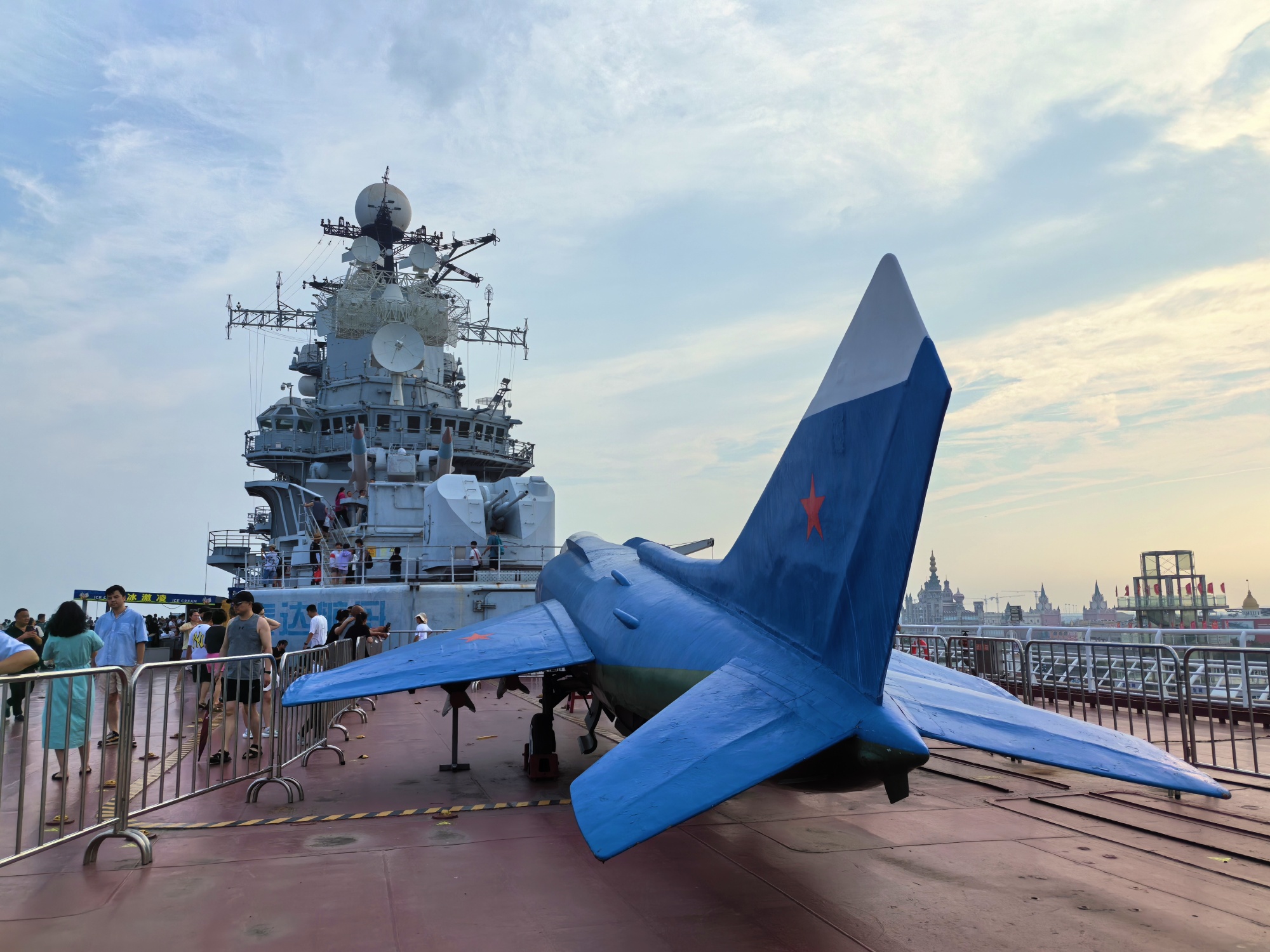 Tourists visit the flight deck of retired aircraft carrier Kiev at an aircraft carrier theme park in Tianjin on July 21, 2024. /CGTN