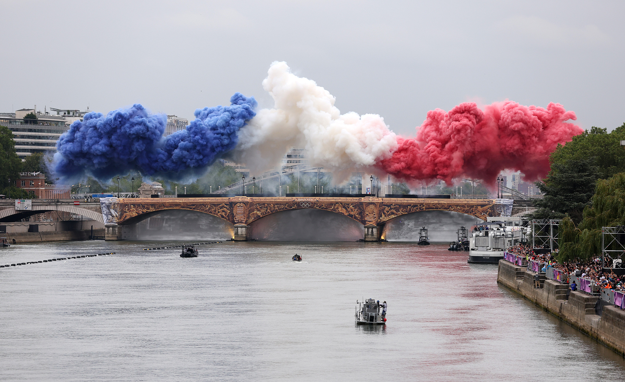 Smoke representing the colors of the French national flag is shown during the opening ceremony of the Paris 2024 Olympic Games in Paris, France, July 26, 2024. /CFP
