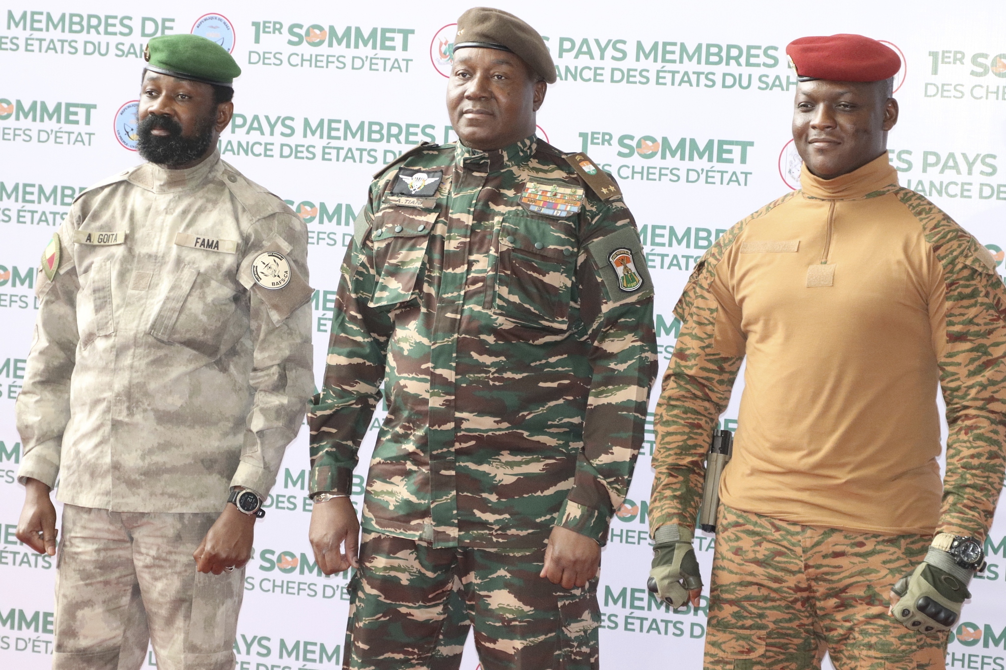 Mali's transitional President Assimi Goita (left), Niger's head of state, Abdourahmane Tchiani (center), and Burkina Faso's interim President Ibrahim Traore take part in the first summit of the Alliance of the Sahel States. /CFP