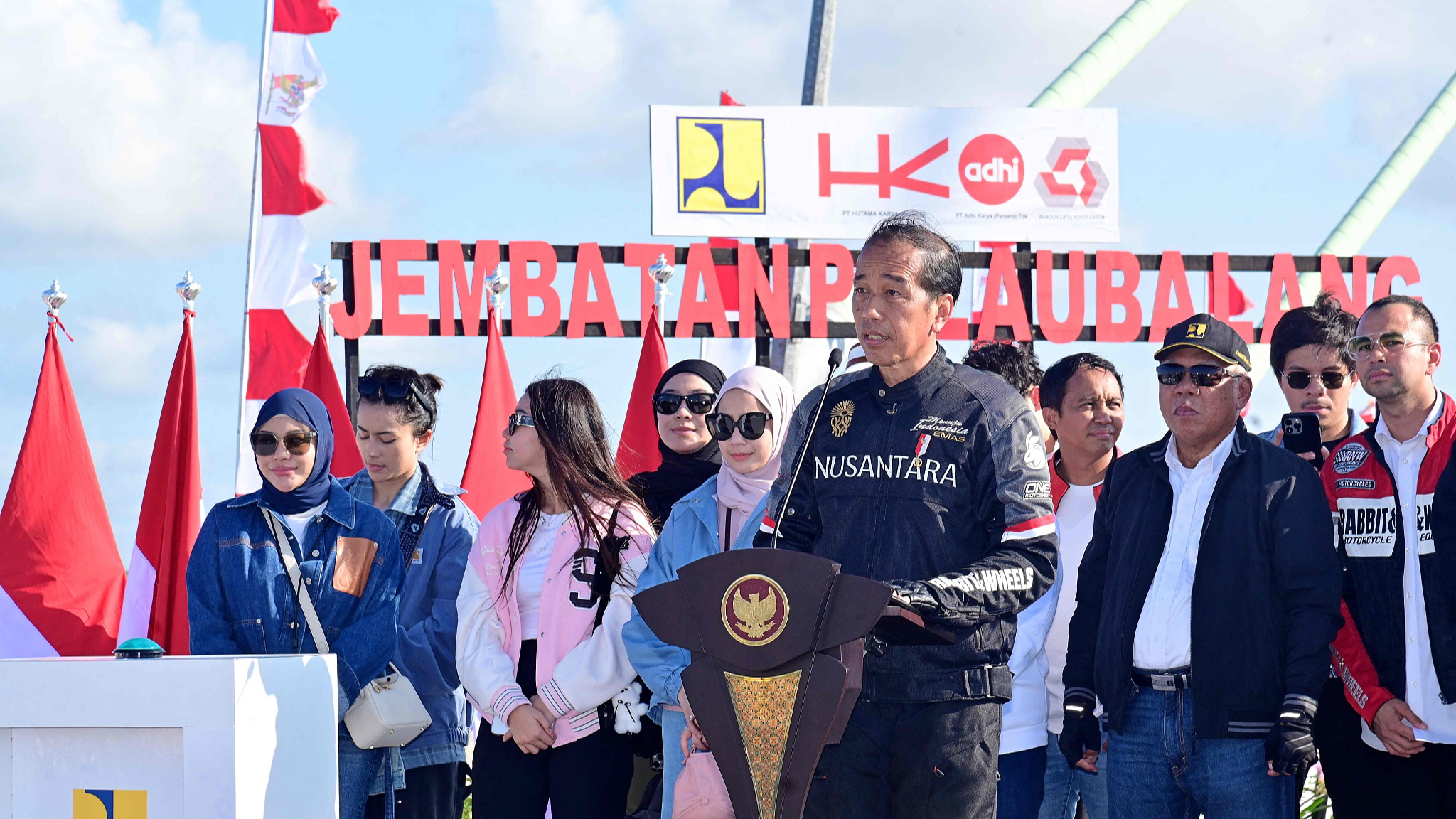 This handout picture taken on July 28, 2024 and released by Indonesia's Presidential Palace shows Indonesia's President Joko Widodo speaking during the inauguration of the Balang Island Bridge on the new toll road linking Balikpapan and the new capital Nusantara (IKN) in Penajam Paser Utara, East Kalimantan. /CFP