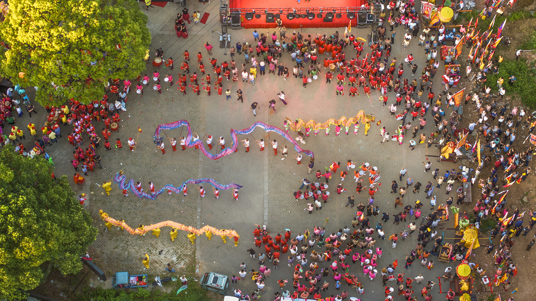 An aerial photo shows a dragon performance at the Lotus Festival in Suzhou, Jiangsu Province on July 29, 2024. /CFP