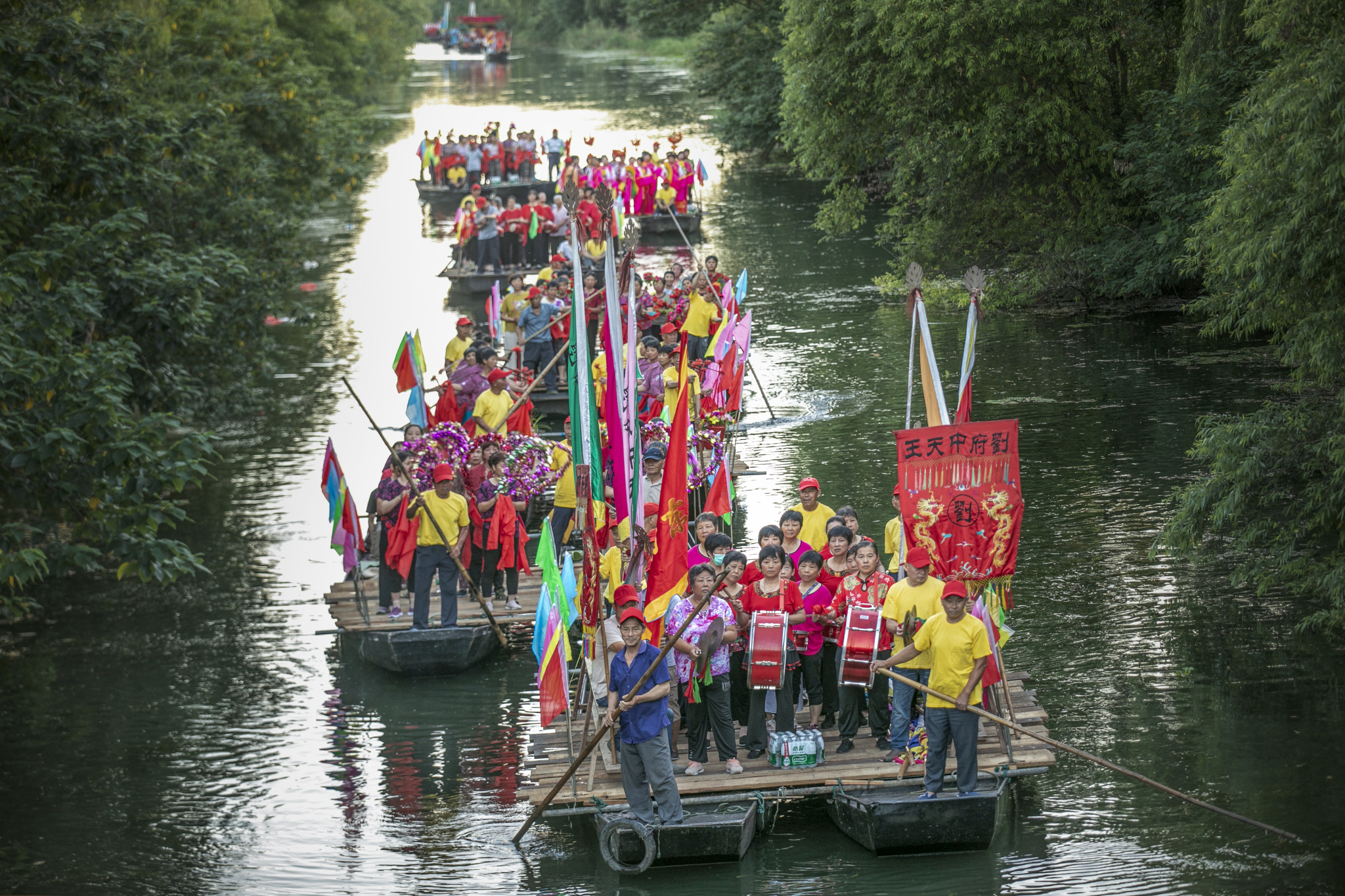 A floating parade is seen during the Lotus Festival held in Suzhou, Jiangsu Province on July 29, 2024. /CFP