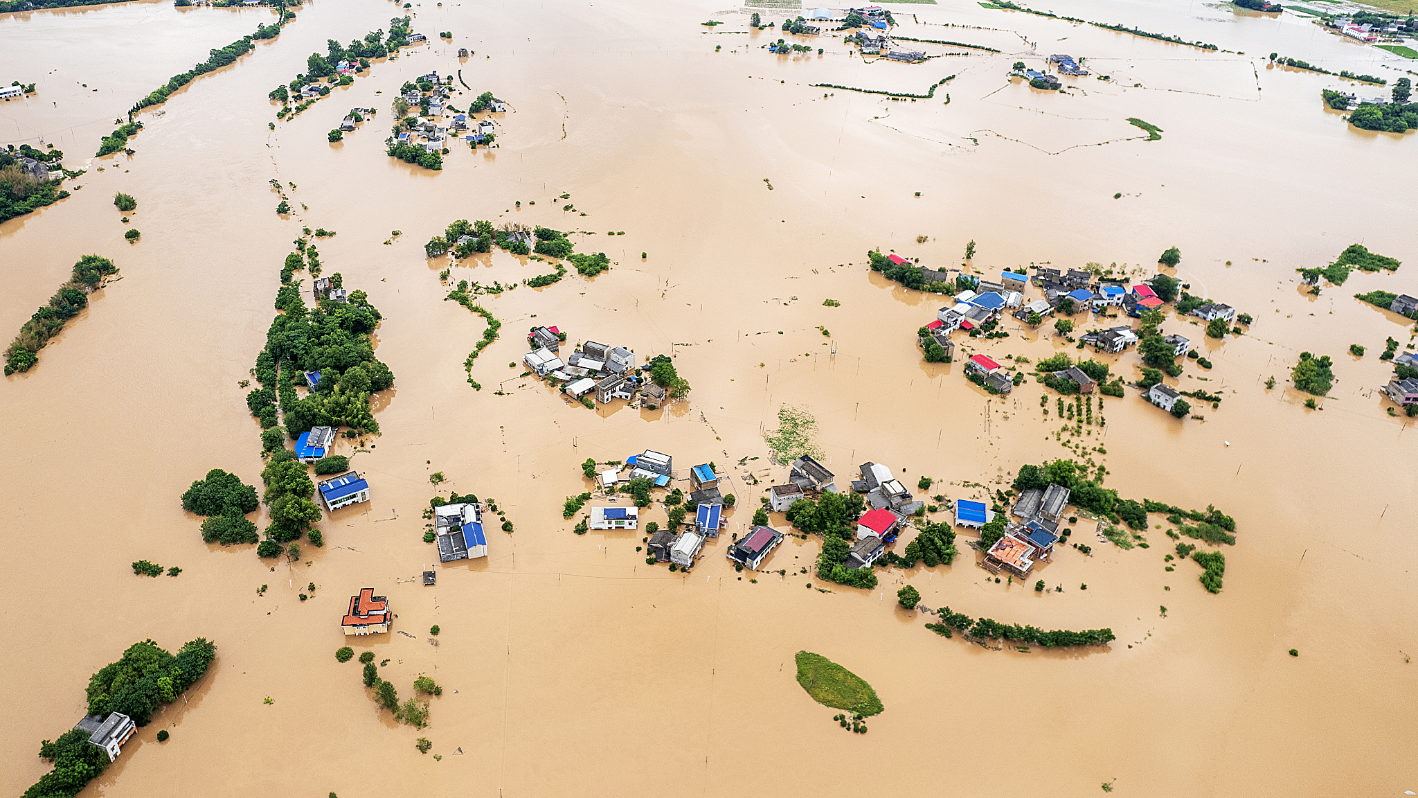 A flooded village after a dike breach in a section of the Juanshui River due to heavy rainfall in Yisuhe Town, Xiangtan, central China's Hunan Province, July 28, 2024. /CFP