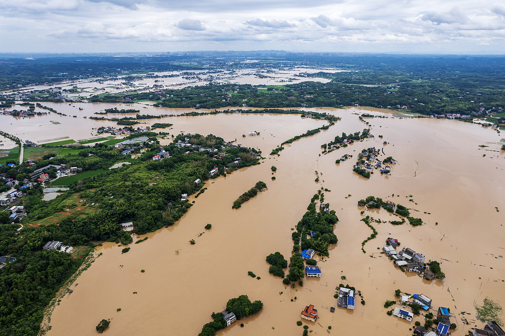 Dike breach took place around 8 p.m. in the section of the Juanshui River in Yisuhe Town, July 28, 2024. /CFP