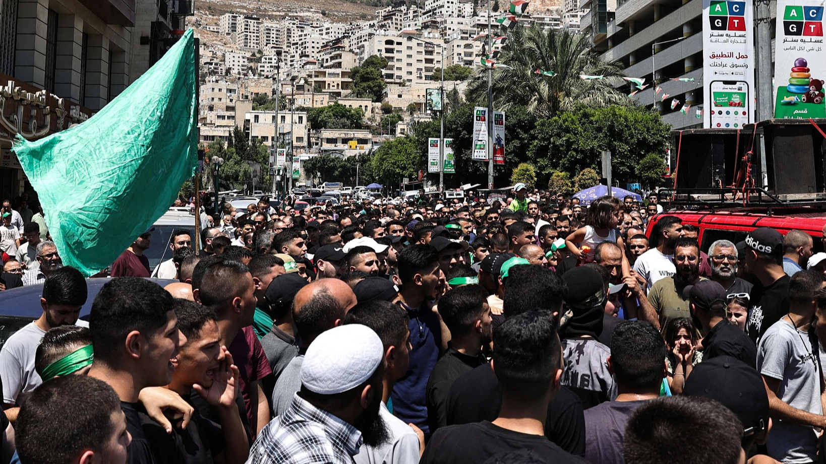 Palestinians attend a protest in Nablus in the Israeli-occupied West Bank following the assassination of Hamas Politburo chief Ismail Haniyeh, July 31, 2024. /CFP