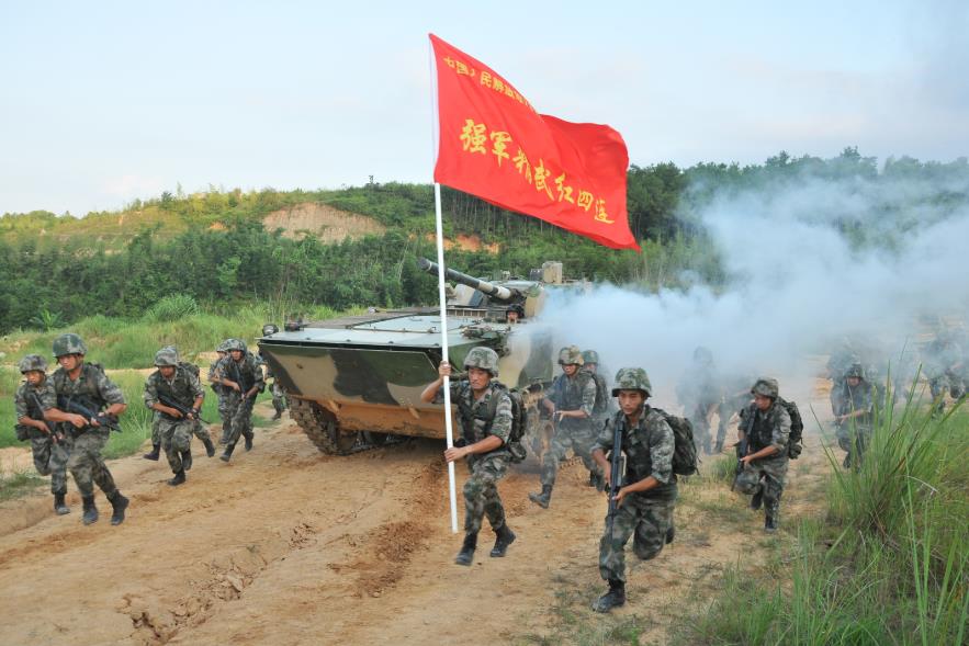 Chinese President Xi Jinping has replied to a letter from the model military company pictured above. /China Media Group