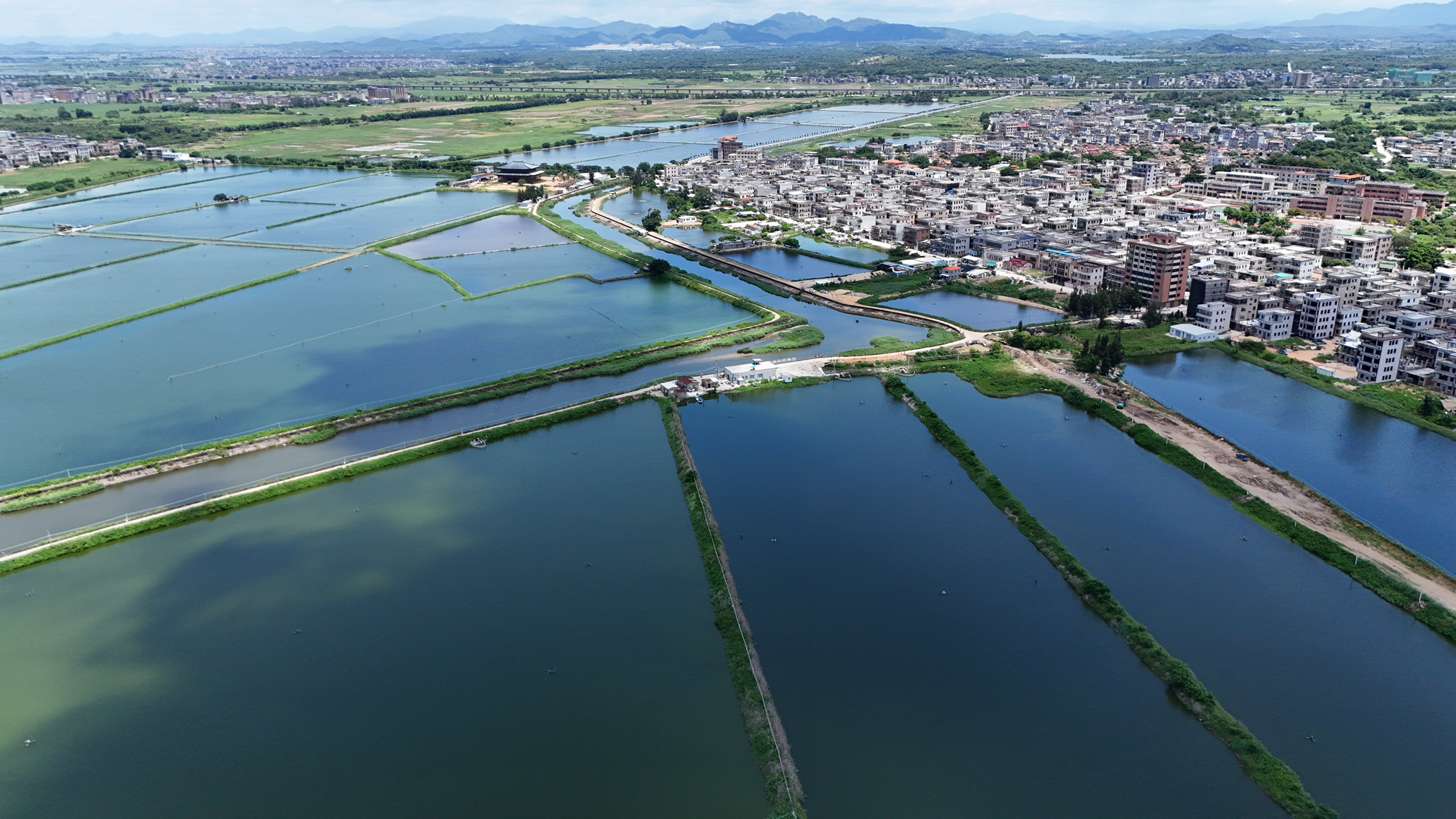 A bird's eye view above a fishing farm in Huilai. 