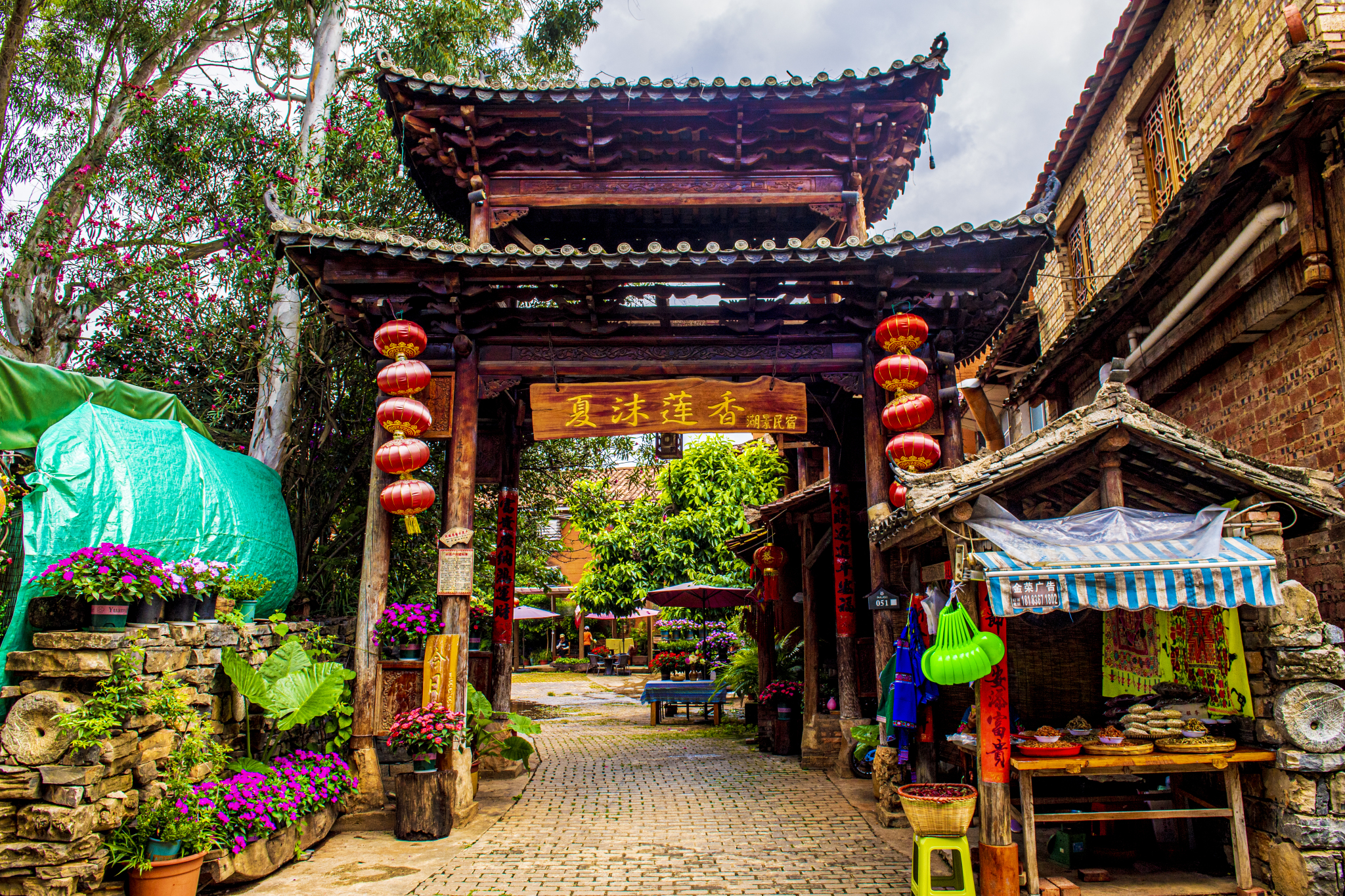 A house in the Yi ethnic style is pictured in Xianrendong Village, Yunnan Province on July 6, 2024. /CFP 