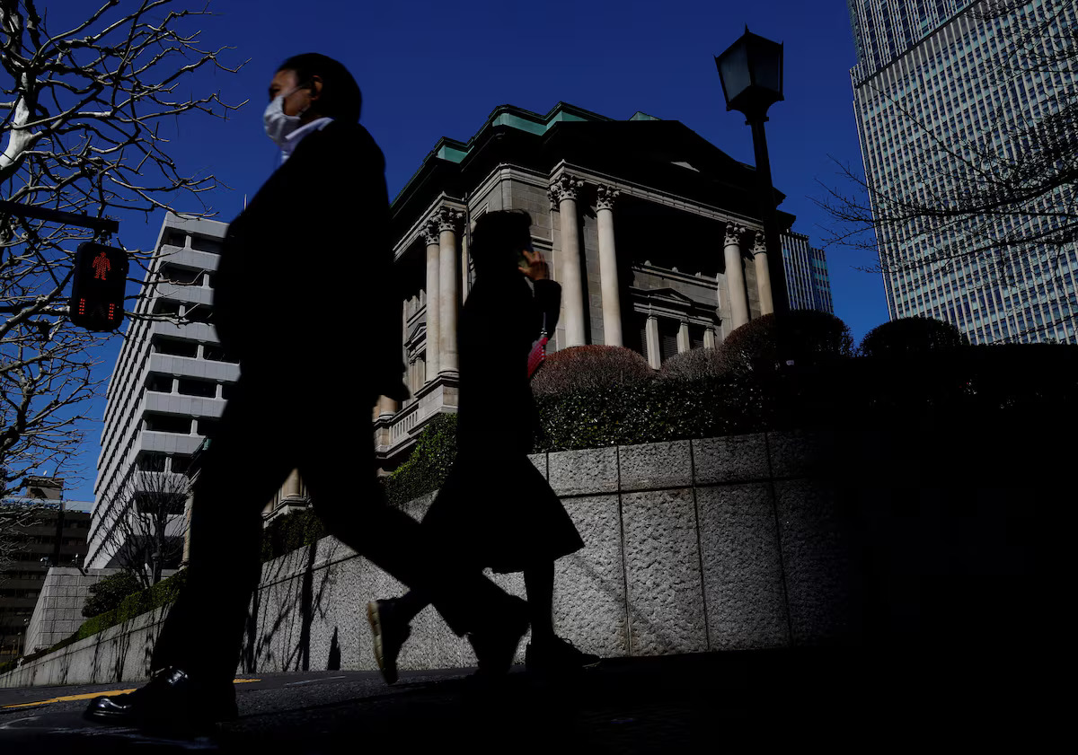 Pedestrians walk past the Bank of Japan building in Tokyo, Japan, March 18, 2024. /Reuters