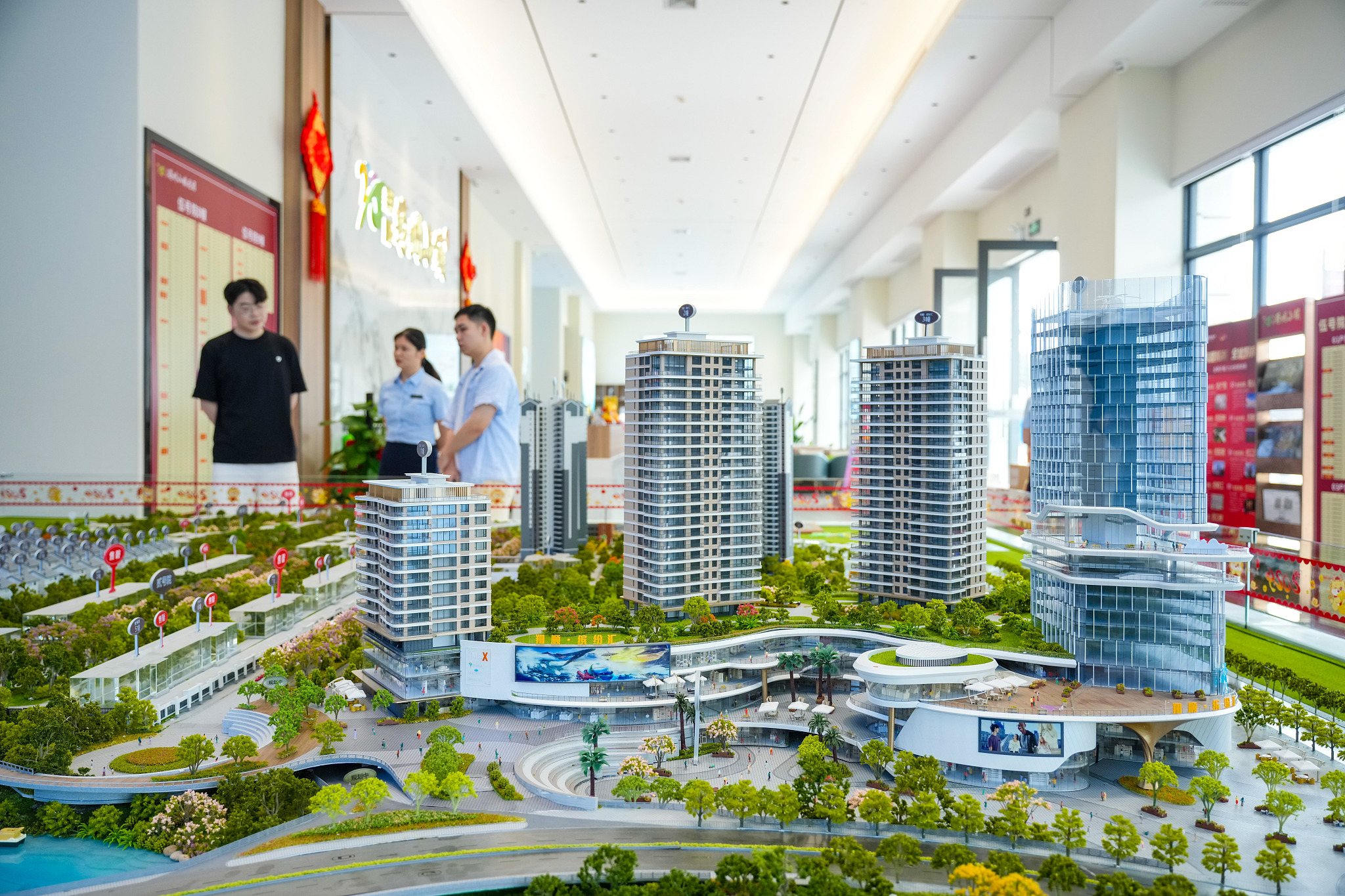 Customers select residential housing units at a real estate sales office in Yunfu City, Guangdong Province, July 6, 2024. /CFP