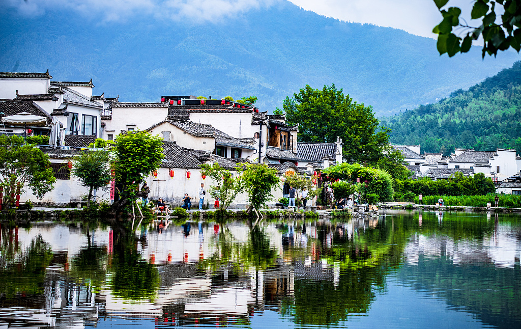 Hui-style structures built near clear waters are seen in Hongcun Village, east China’s Anhui Province, June 19, 2024. /CFP