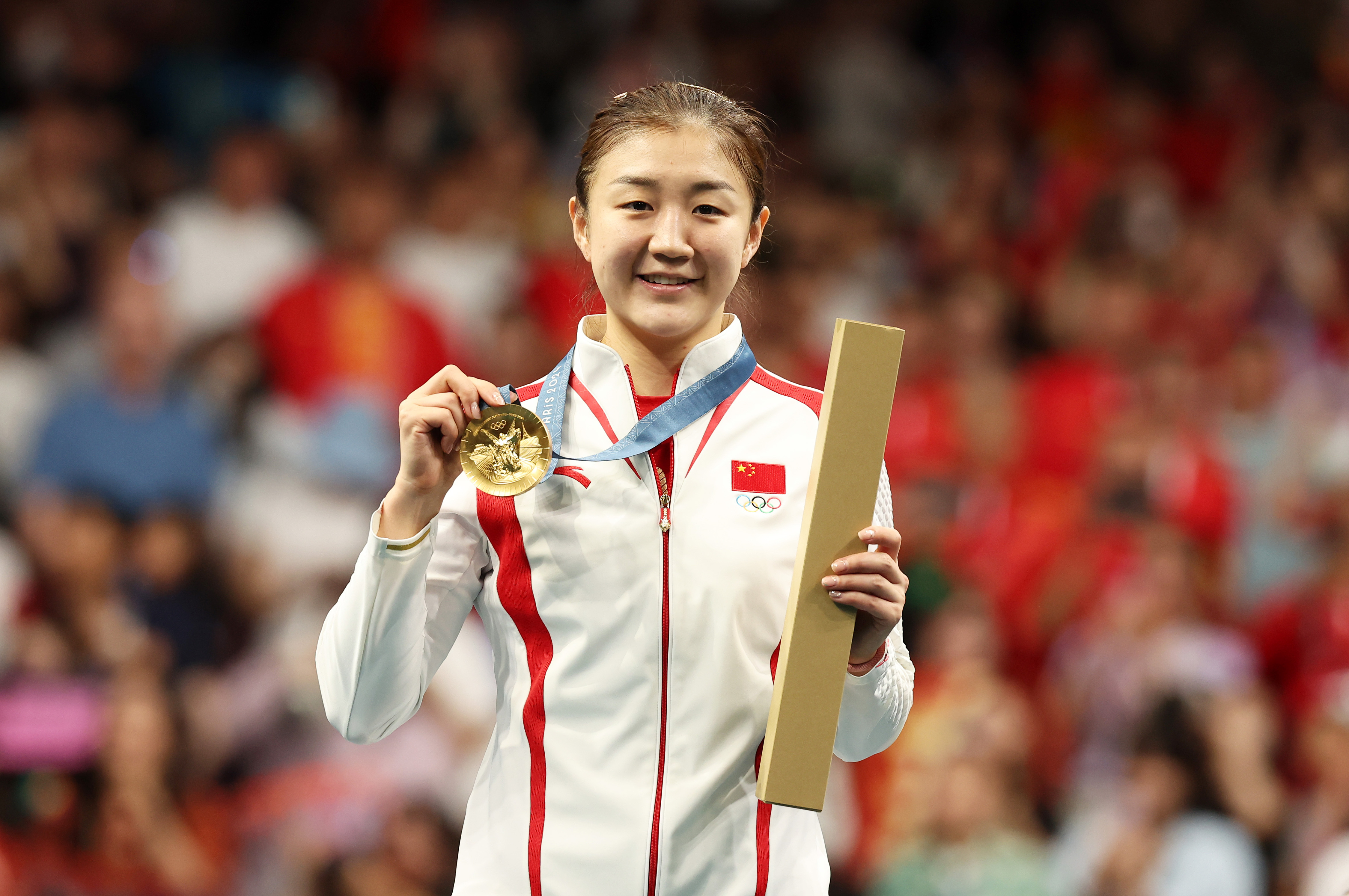 China's gold medallist Chen Meng stands on the podium during the table tennis women's singles medal ceremony at the Paris 2024 Olympic Games in Paris, France, August 3, 2024. /CFP