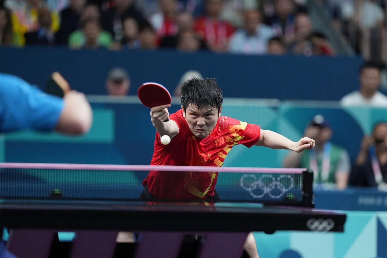 China's Fan Zhendong hits a shot the men's singles table tennis final at the 2024 Summer Olympics at South Paris Arena 4 in Paris, France, August 4, 2024. /CFP