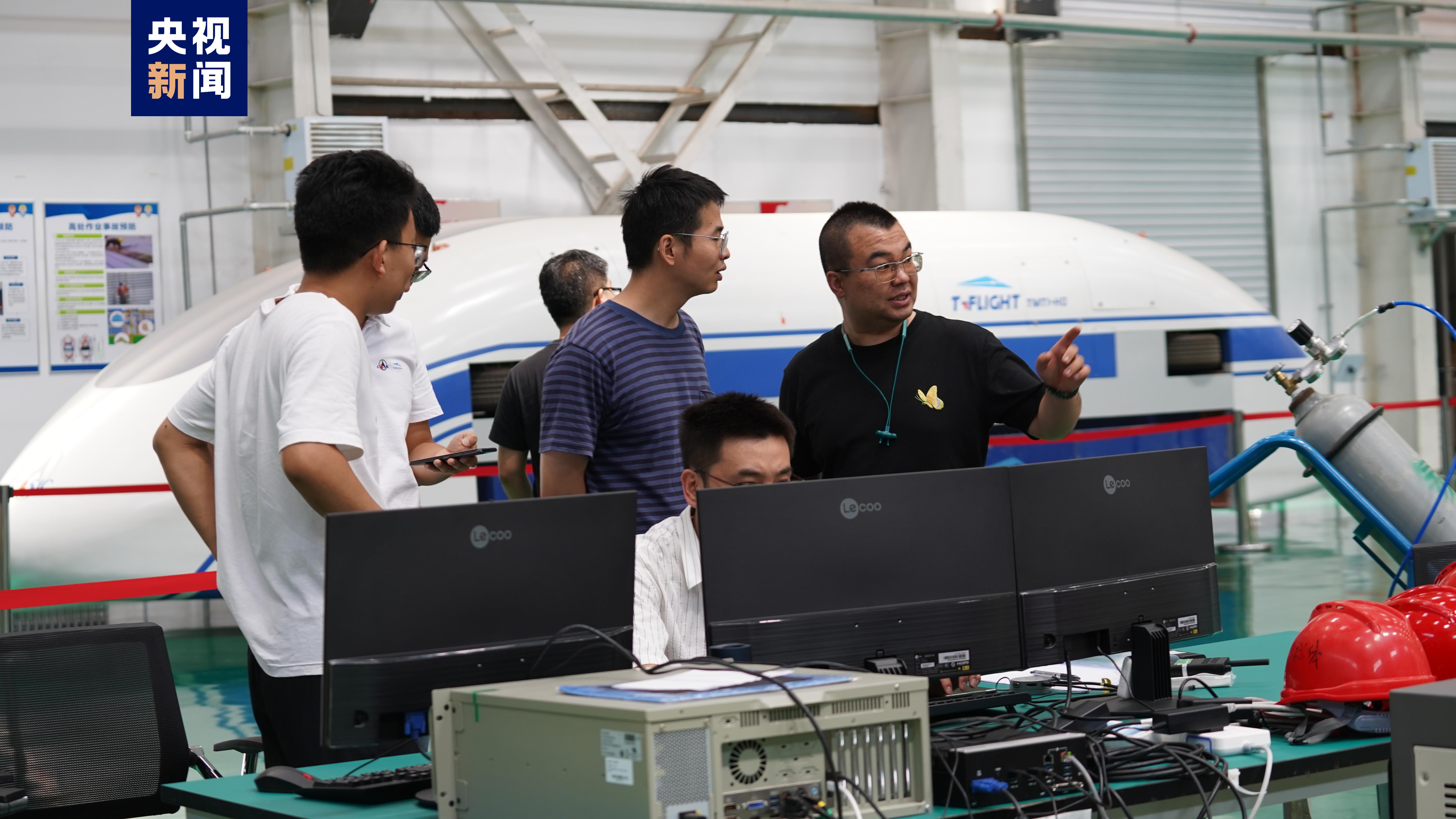 Staff members on duty during the demonstration test for a novel ultra-high-speed maglev transportation system, Yanggao County, Datong City, north China's Shanxi Province. /CMG