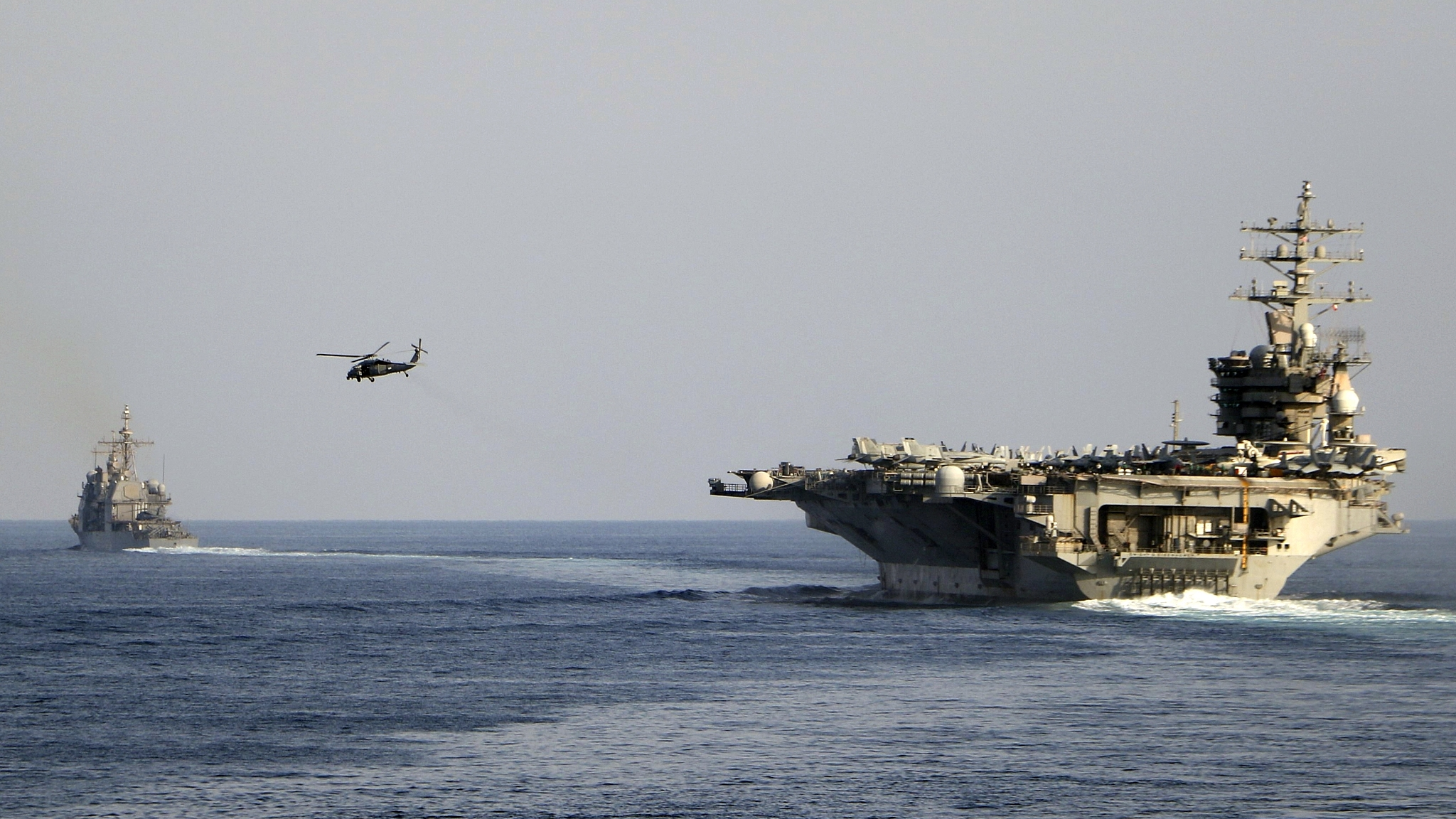 The aircraft carrier USS Dwight D. Eisenhower and other warships cross the Strait of Hormuz into the Persian Gulf, November 26, 2023. /CFP