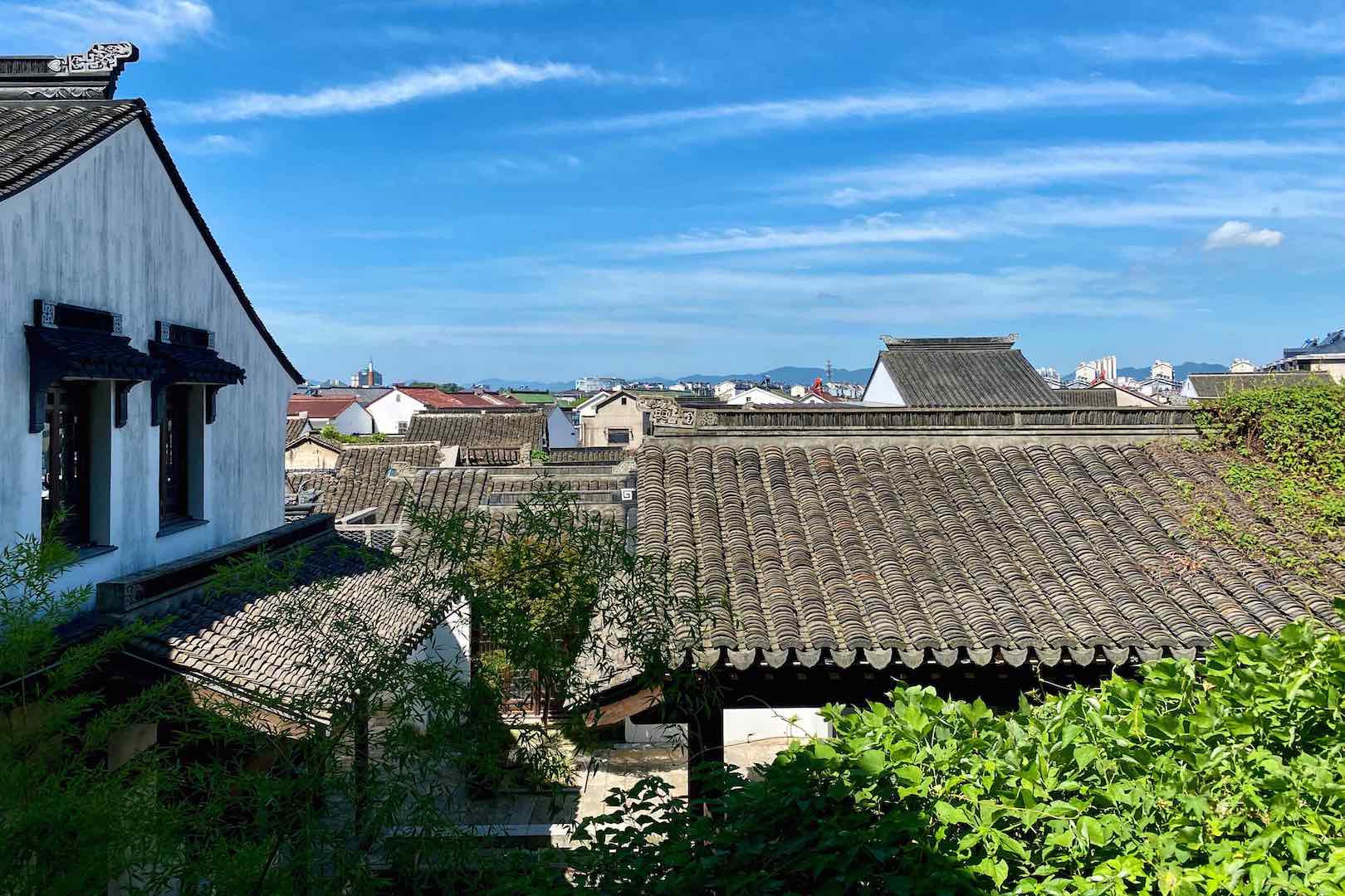 A photo shows the Gunan Street in Yixing, Jiangsu Province. The white walls and gray tiles are typical of the Hui style of architecture. /CGTN