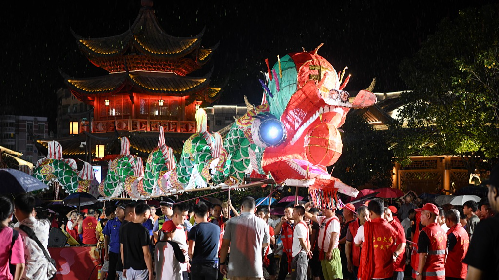 A photo taken on August 4, 2024 shows the Gutian dragon lifted high by performers in Longyan, Fujian Province, China. /CFP