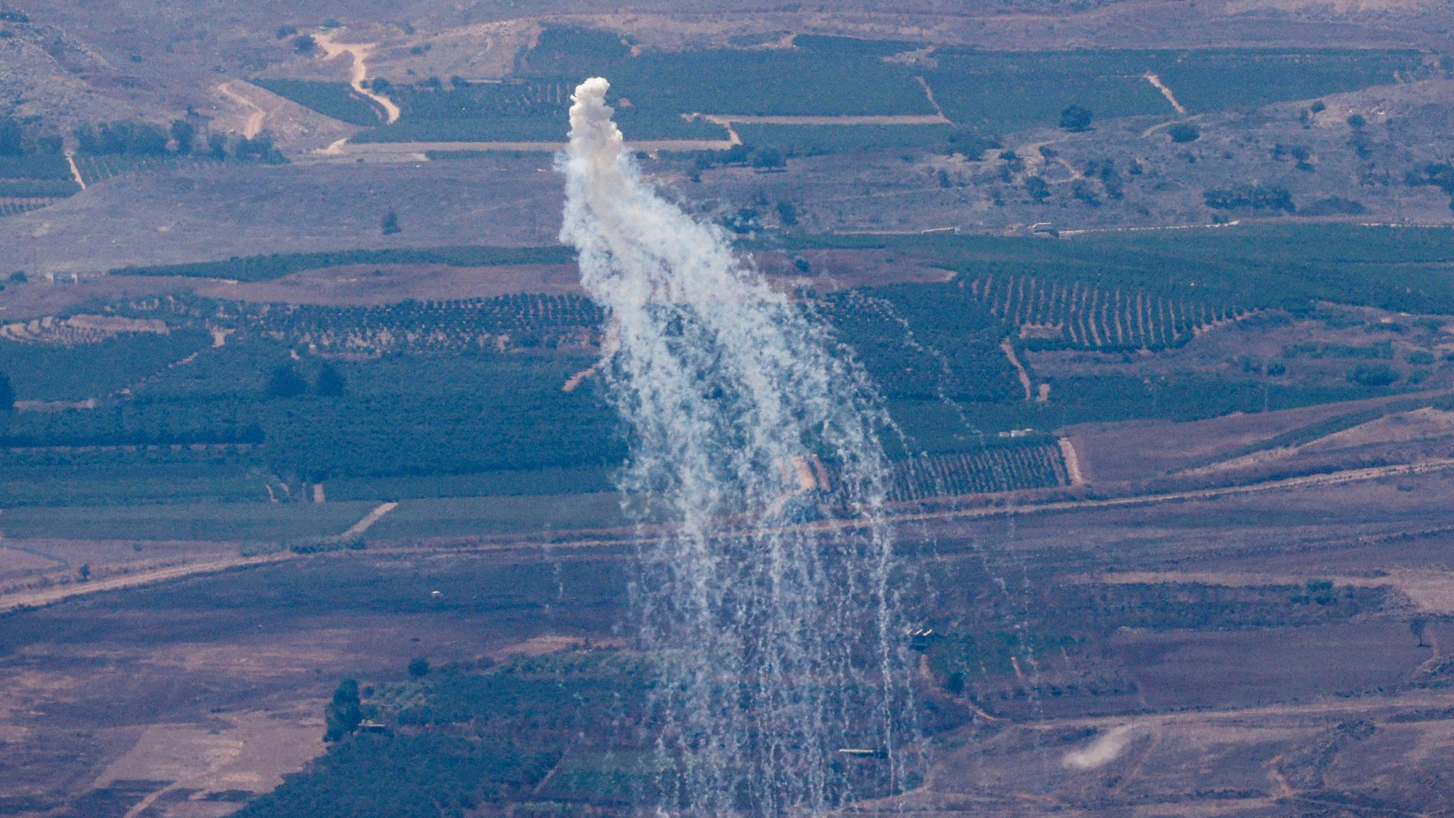 This picture taken from northern Israel near the border with Lebanon shows smoke billowing during Israeli bombardment above the Lebanese Wazzani area, August 5, 2024. /CFP