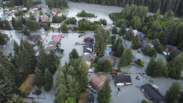 Over 100 homes damaged as Alaska glacier releases water