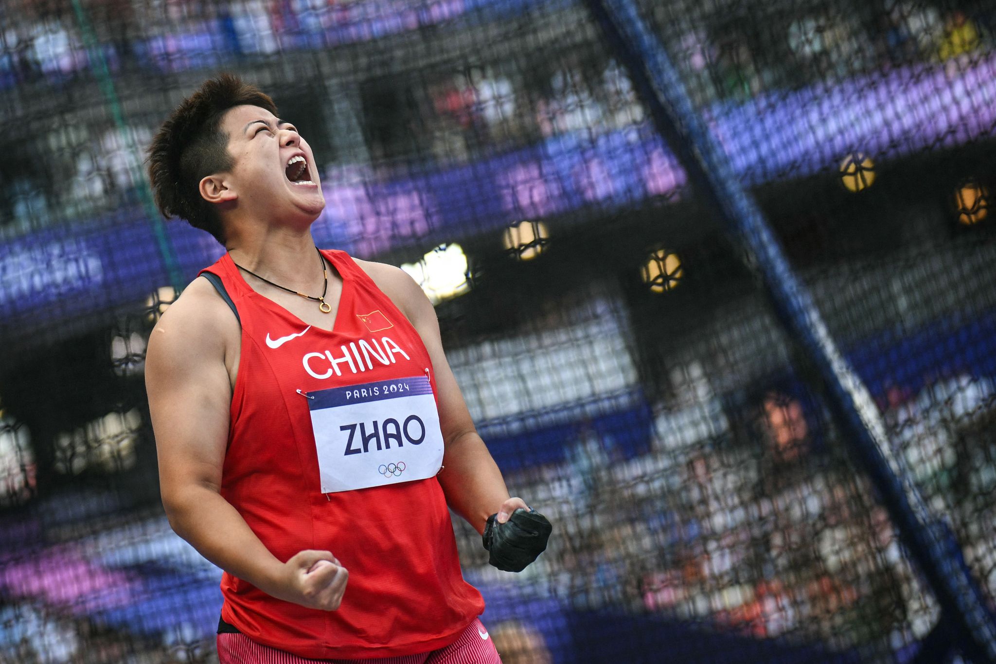 Zhao Jie of China reacts when she competes in the women's hammer throw final at the 2024 Summer Olympic Games in Paris, France, August 6, 2024. /CFP