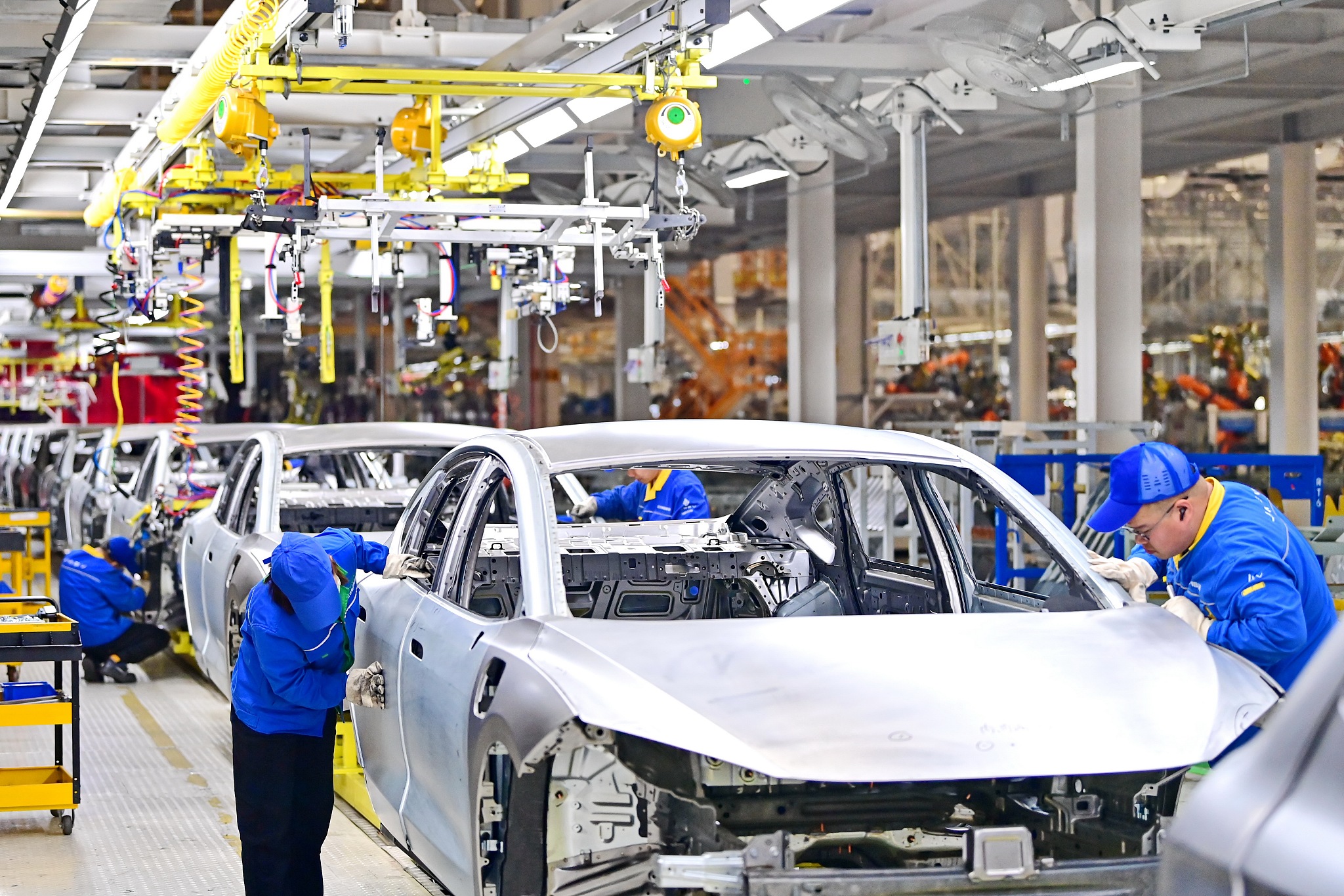 Workers on the production line of an automobile manufacturer in Nanchang City, east China's Jiangxi Province, April 2, 2024. /CFP