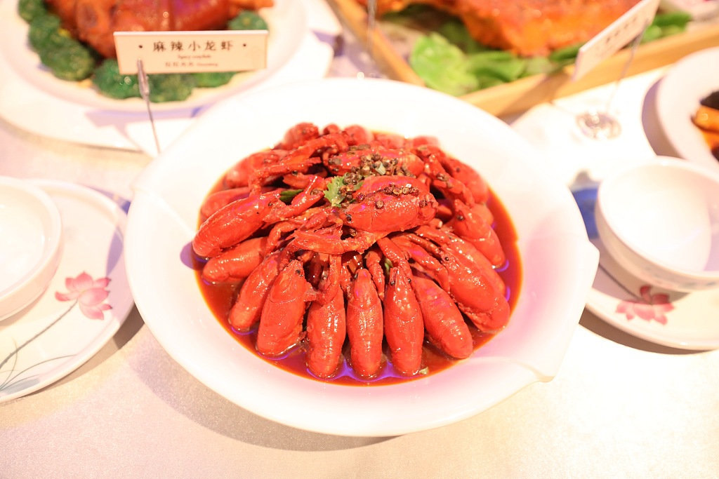 A spicy crayfish dish is on display at an exhibition at the National Museum of China in Beijing on August 6, 2024. /CFP
