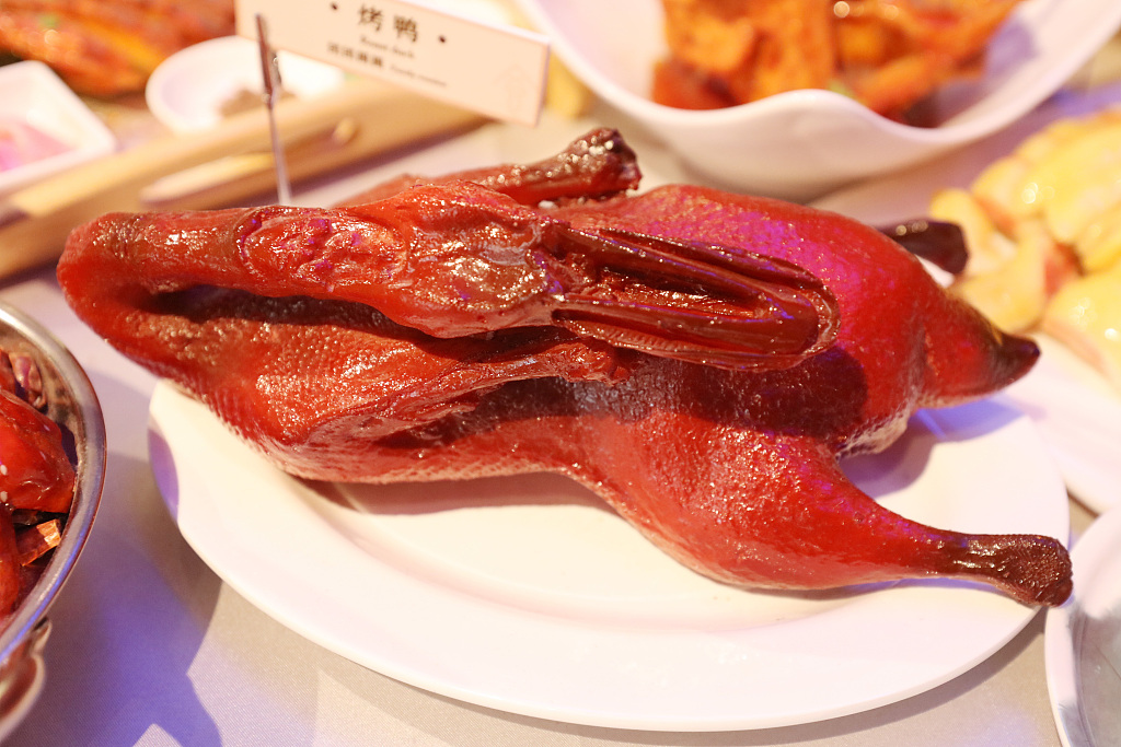 A Peking roast duck dish is on display at an exhibition at the National Museum of China in Beijing on August 6, 2024. /CFP