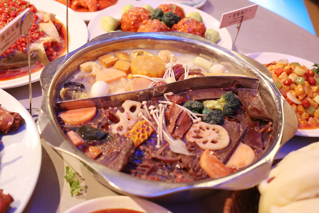 A Sichuan hotpot dish is on display at an exhibition at the National Museum of China in Beijing on August 6, 2024. /CFP