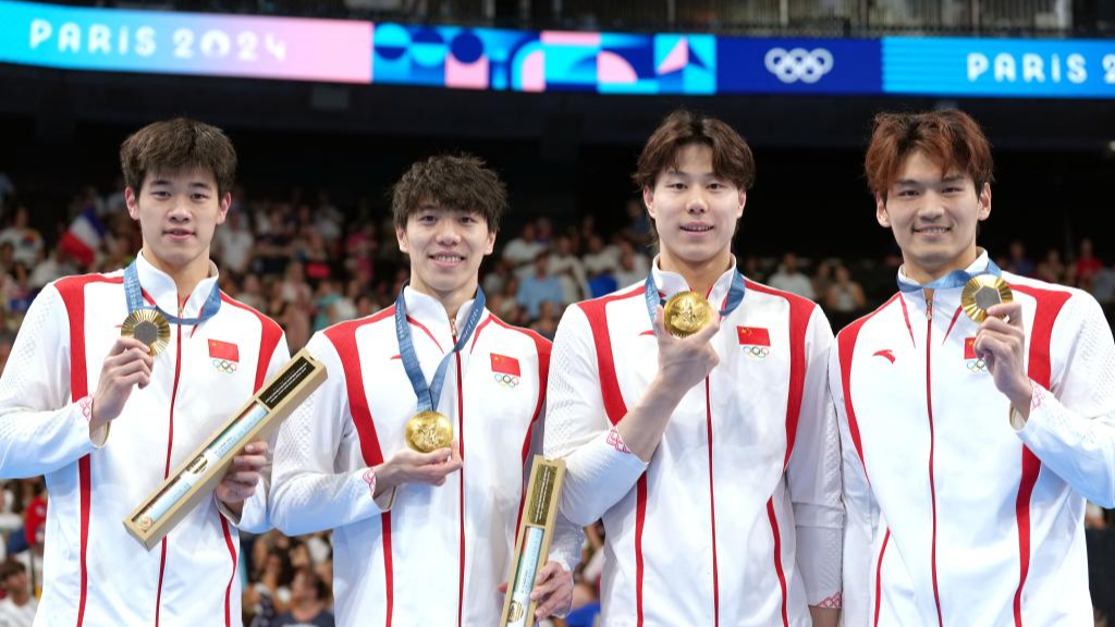 Gold medalists Team China attend the victory ceremony for the men's 4x100m medley relay of swimming at the Paris 2024 Olympic Games in Paris, France, August 4, 2024. /Xinhua