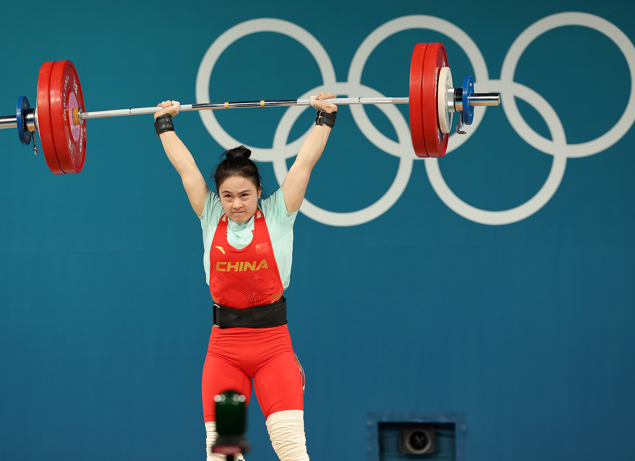 Gold medalist Luo Shifang competes in the women's 59kg weightlifting final at the 2024 Summer Olympics in Paris, France, August 8, 2024. /CFP