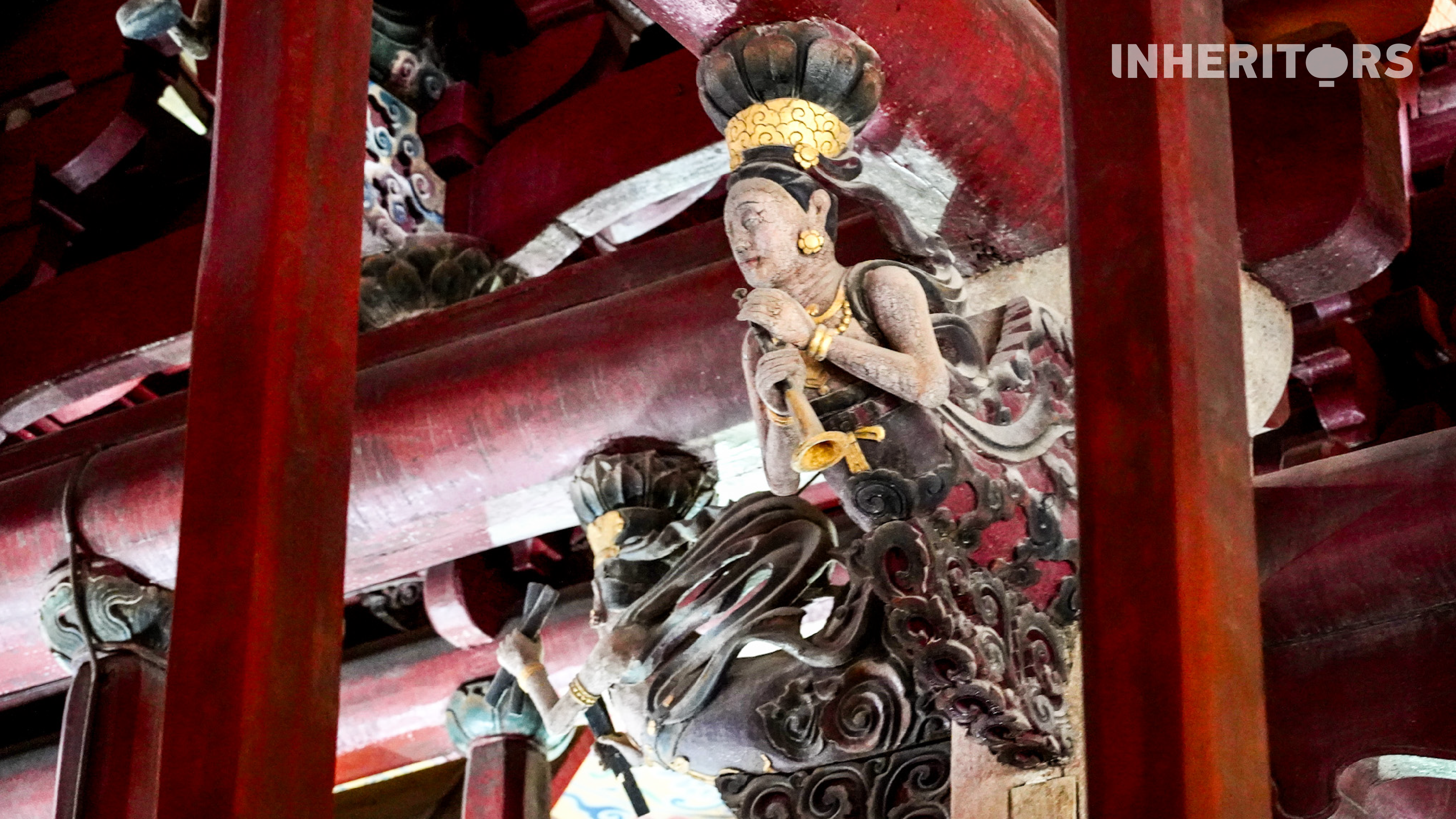 A view of exquisite woodcarvings of flying Apsaras in the main hall of the Kaiyuan Temple in Quanzhou, Fujian Province. /CGTN