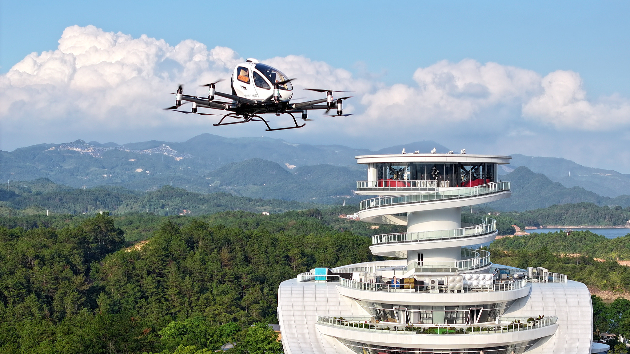 Passengers ride on an eVTOL aircraft in Wenzhou City, east China's Zhejiang Province, July 16, 2024. /CFP