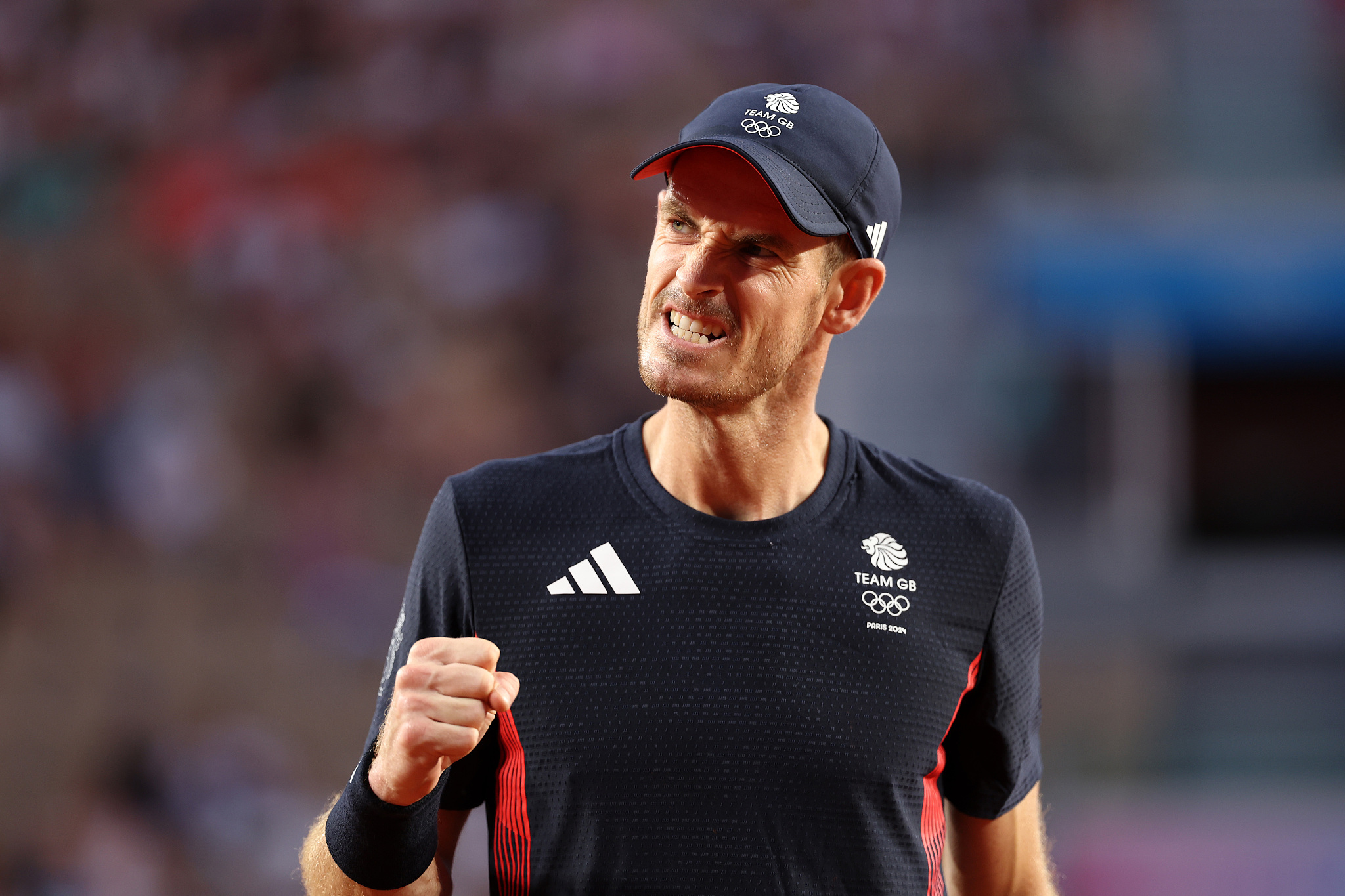 Andy Murray of Great Britain reacts after hitting a winner in the men's doubles tennis quarterfinals with Daniel Evans against Tommy Paul and Taylor Fritz of the USA at the 2024 Summer Olympics in Paris, France, August 1, 2024. /CFP