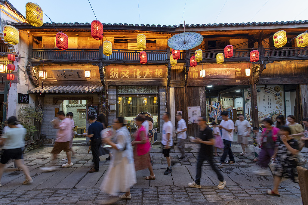 People visit the Poyang Night Market in Jinhua City, Zhejiang Province, August 10, 2024. /CFP