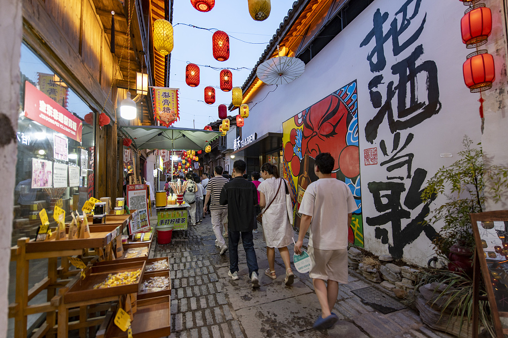 People visit the Poyang Night Market in Jinhua City, Zhejiang Province, August 10, 2024. /CFP