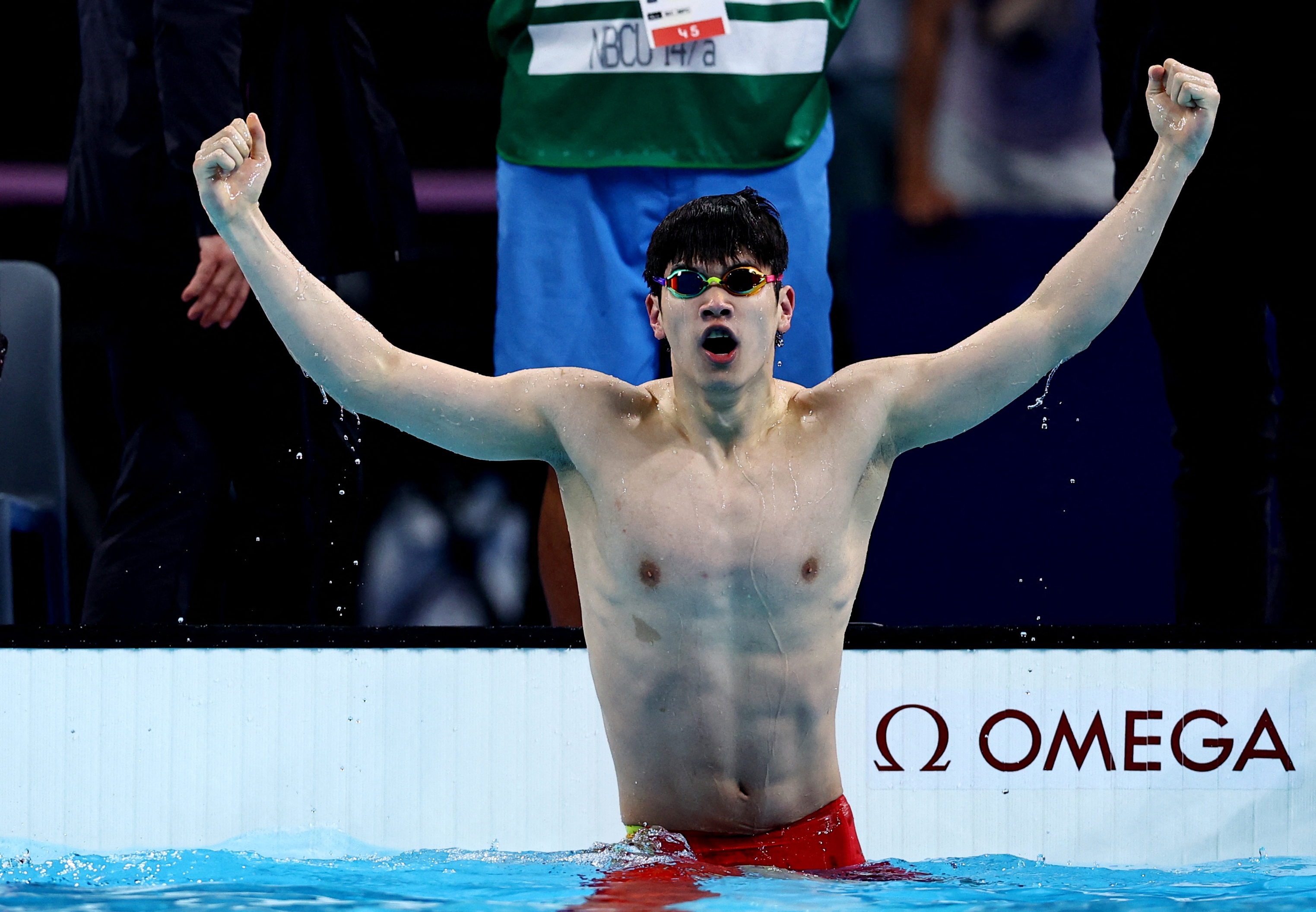 Chinese swimmer Pan Zhanle celebrates as he wins the men's 100m freestyle at the Paris 2024 Olympic Games in Paris, France, July 31, 2024. /IC