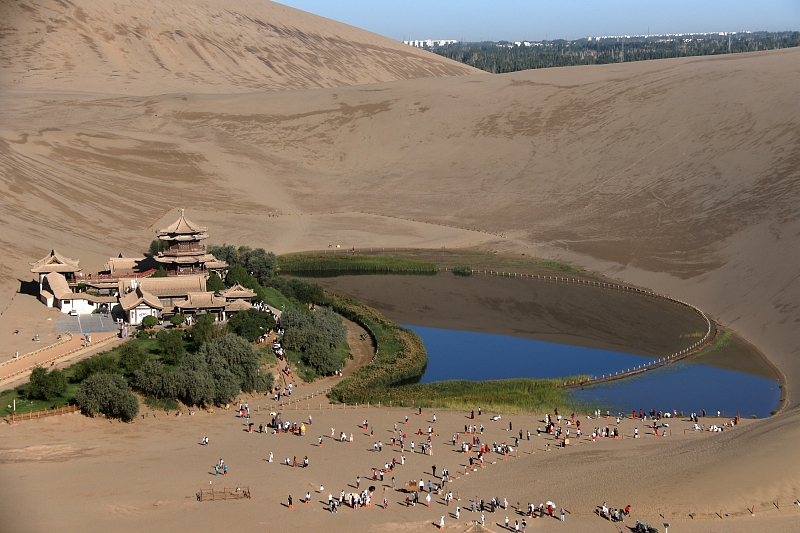 A glimpse of the Mingsha Mountain and Crescent Spring scenic spot in Dunhuang City, Gansu Province, August 9, 2024. /CFP