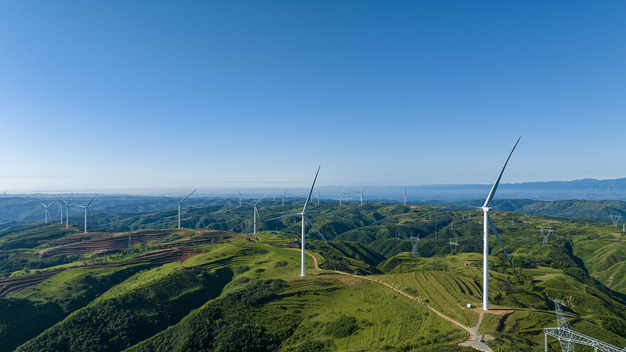 Rows of wind turbines stand atop mountains in Mawu Township, Kongtong District, Pingliang City, Gansu Province, China, June 17, 2024. /CFP