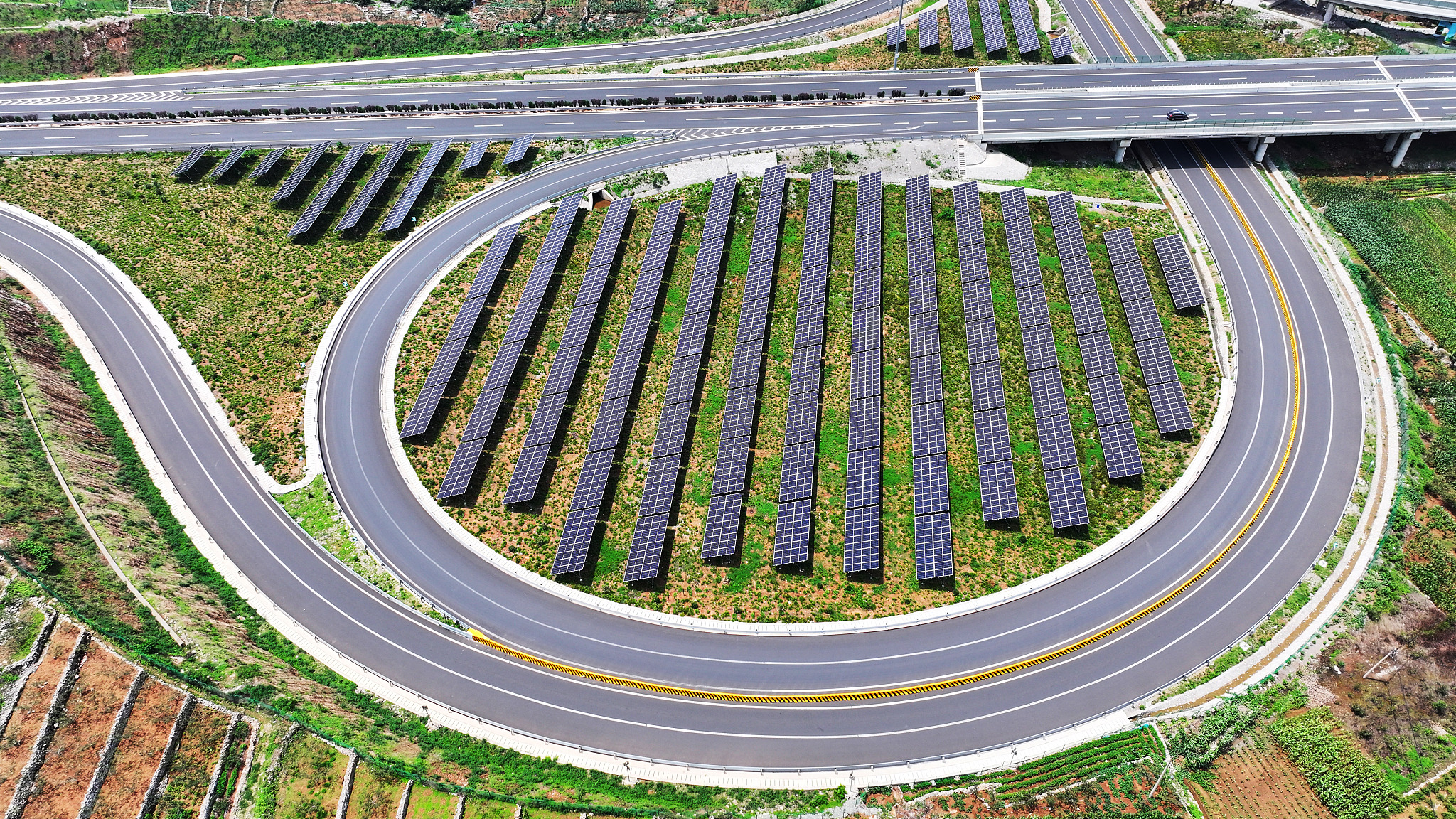 Photovoltaic (PV) panels along the Shanting section of the Tai'an-Taierzhuang Expressway in Zaozhuang City, east China's Shandong Province. /CFP