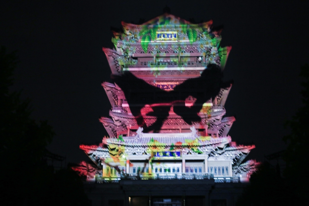 A 3D mapping show is staged at the Chaoran Tower in Jinan, Shandong Province on August 10, 2024. /IC