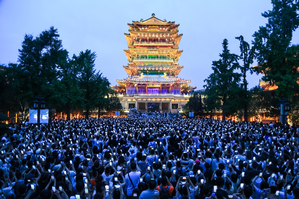 A 3D mapping show is staged at the Chaoran Tower in Jinan, Shandong Province on August 10, 2024. /IC