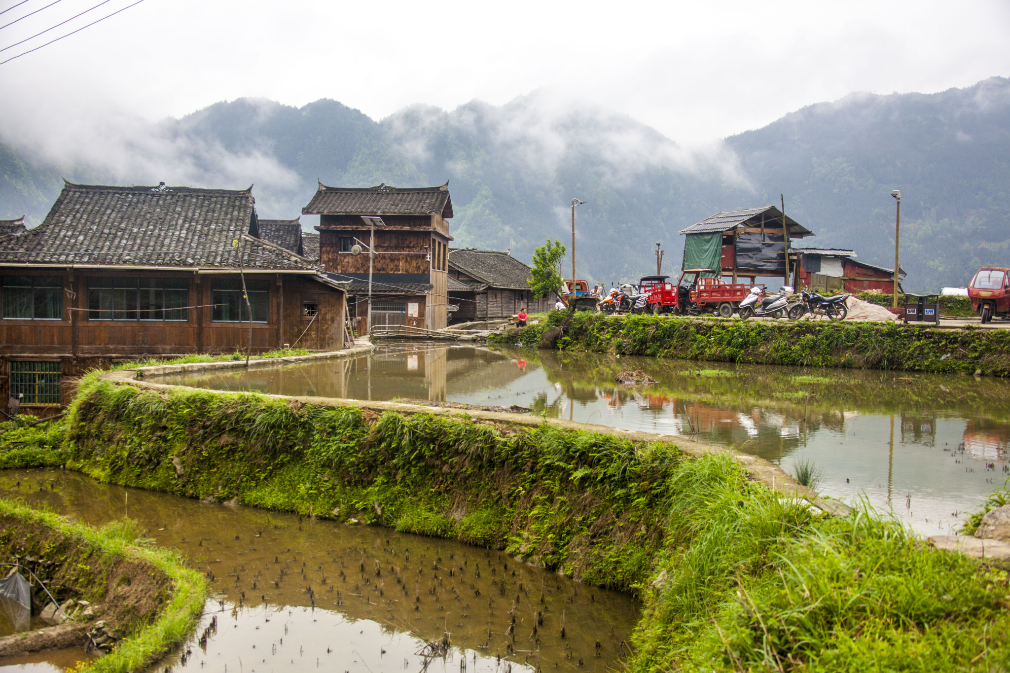 Paddy fields and houses of the Miao ethnic group are pictured in spring in Jiaju Village in Guizhou Province. /CFP