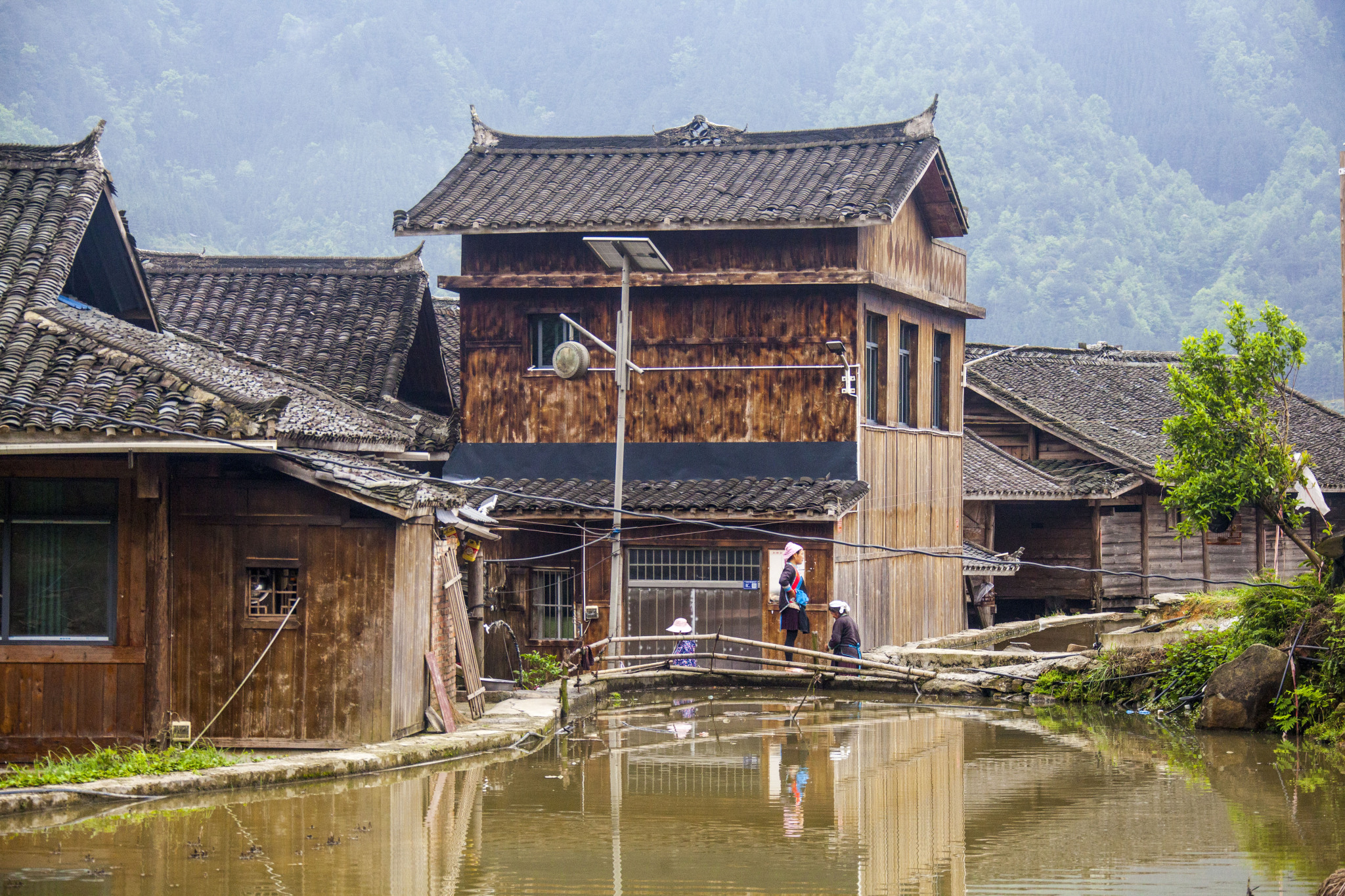 Diaojiaolou, the iconic houses of the Miao people in Jiaju Village, are seen in Guizhou Province. /CFP 