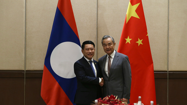 Chinese Foreign Minister Wang Yi, also a member of the Political Bureau of the Central Committee of the Communist Party of China (CPC), meets with Lao Vice Premier and Foreign Minister Saleumxay Kommasith in Chiang Mai, Thailand, August 15, 2024. /China